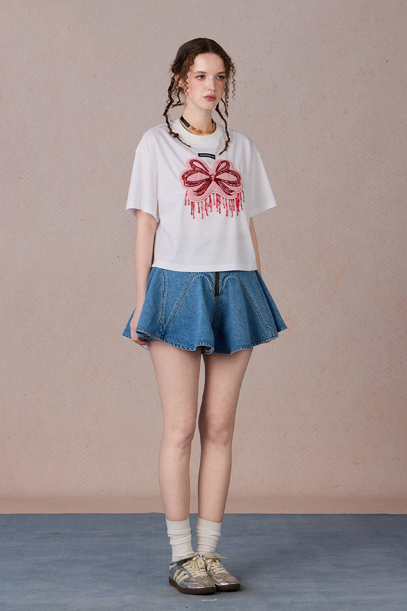 Model wearing floral-shaped pod skirt with relaxed fit – WEANCHEAM