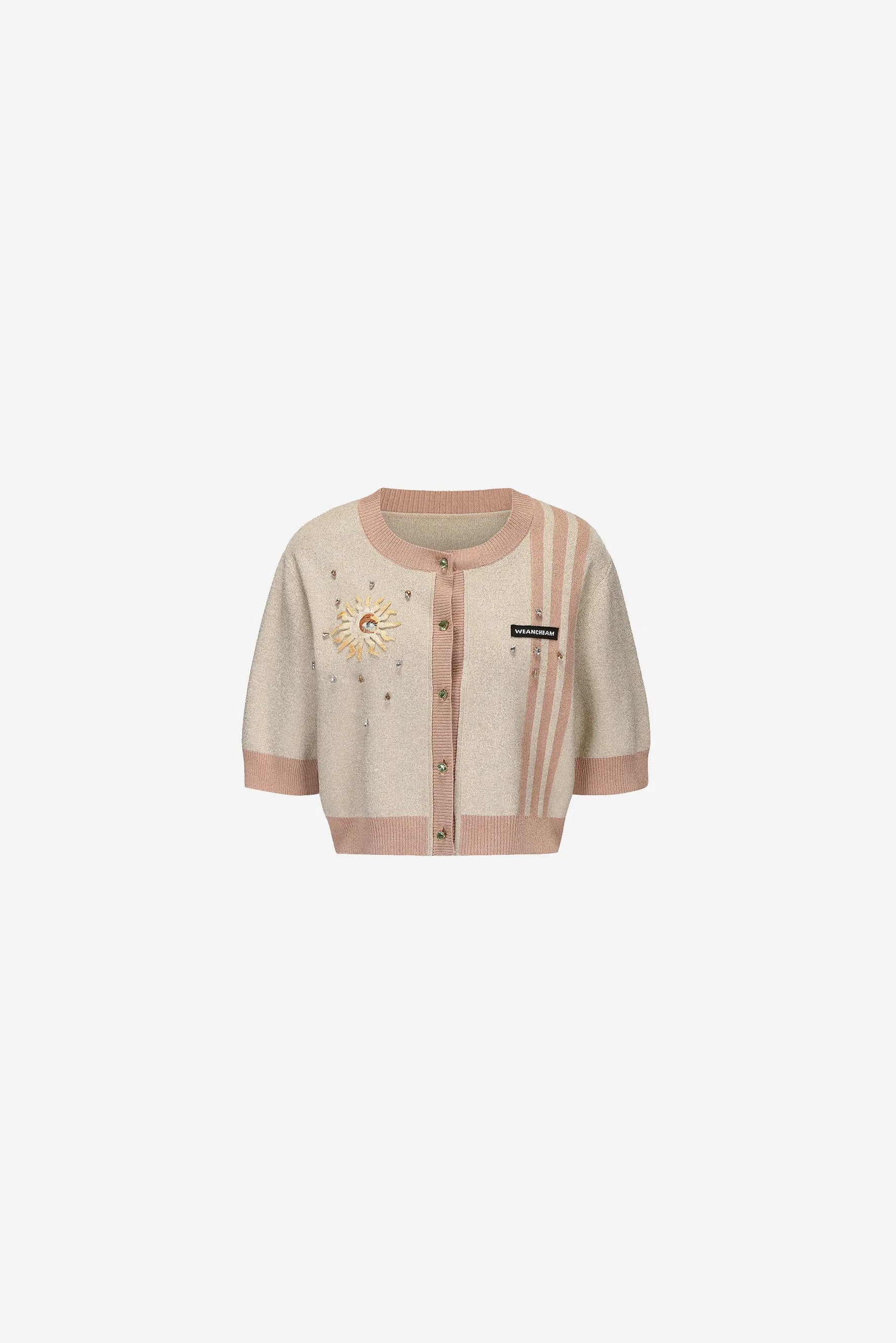 Model wearing beige slim-fit Helios cardigan with hand-painted chest detail – WEANCHEAM