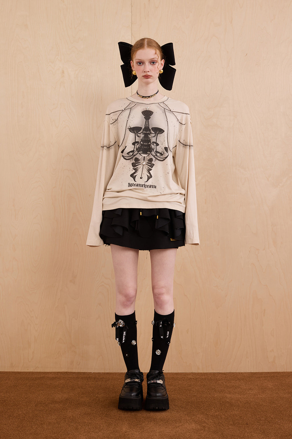 Model in wool-cashmere sweater with crystal chandelier graphic – WEANCHEAM