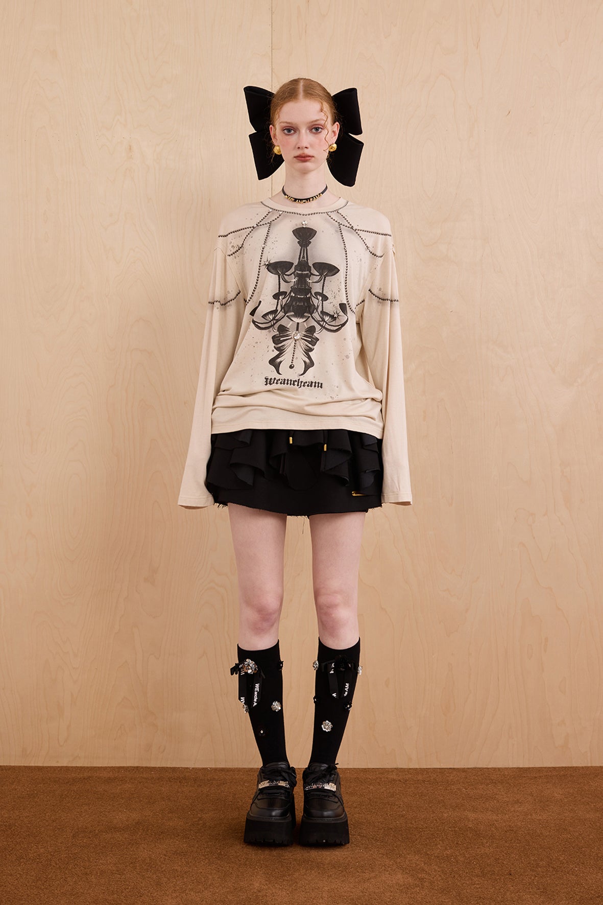 Model in wool-cashmere sweater with crystal chandelier graphic – WEANCHEAM