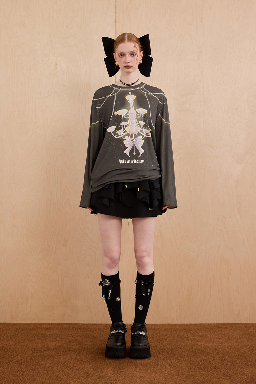 Model in wool-cashmere sweater with crystal chandelier graphic – WEANCHEAM
