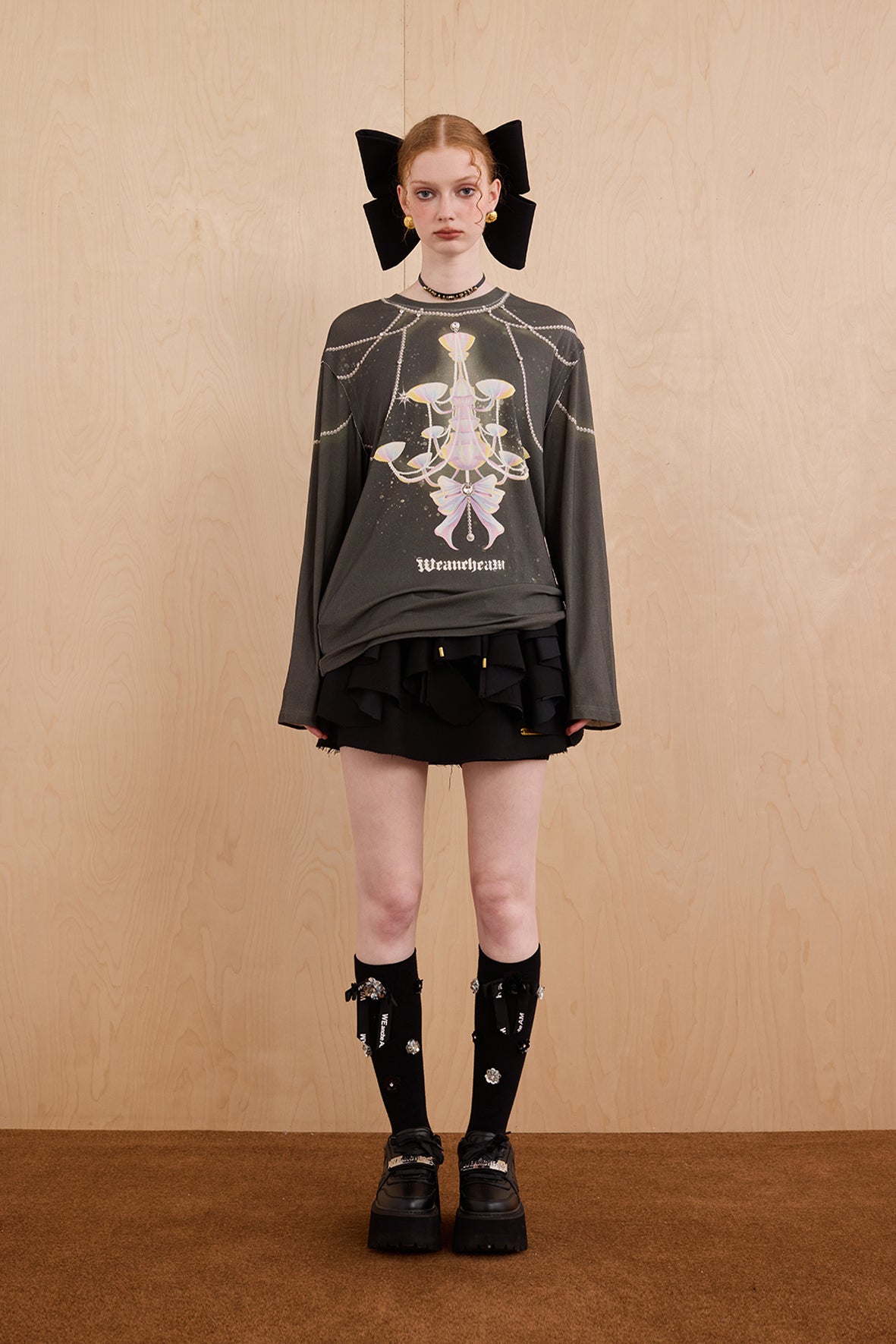 Model in wool-cashmere sweater with crystal chandelier graphic – WEANCHEAM