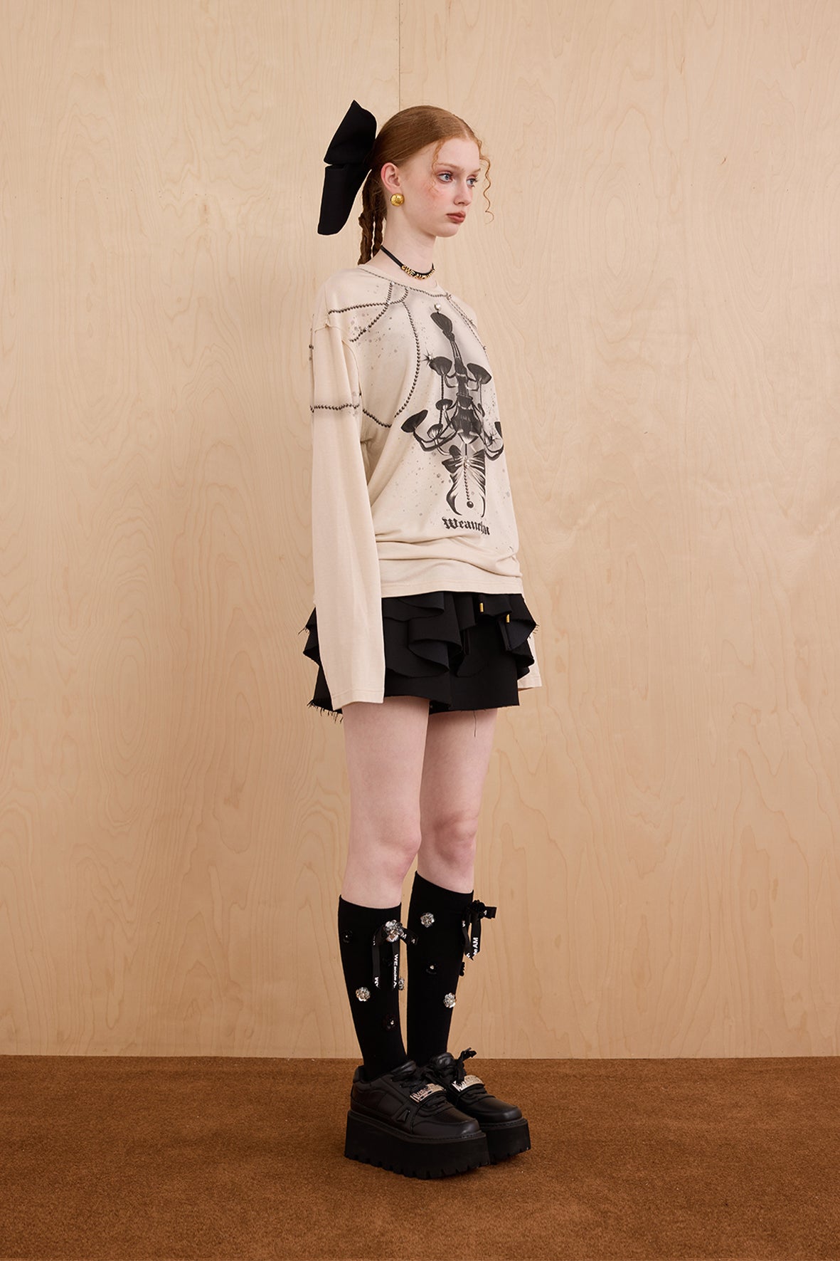 Model in wool-cashmere sweater with crystal chandelier graphic – WEANCHEAM