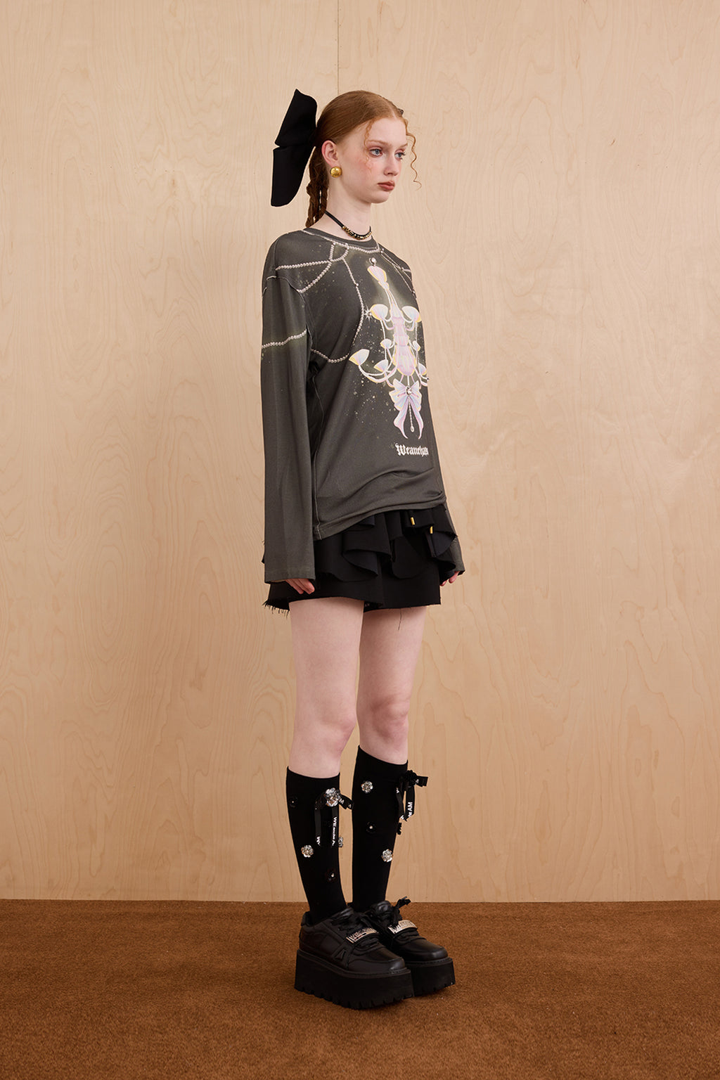 Model in wool-cashmere sweater with crystal chandelier graphic – WEANCHEAM