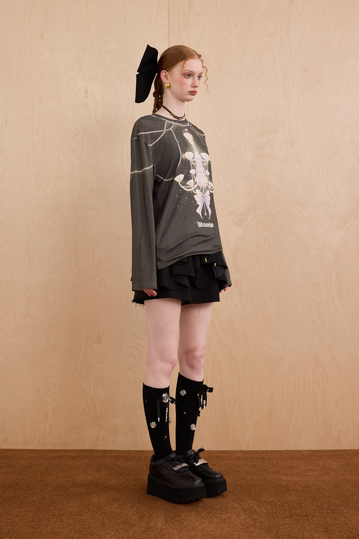Model in wool-cashmere sweater with crystal chandelier graphic – WEANCHEAM