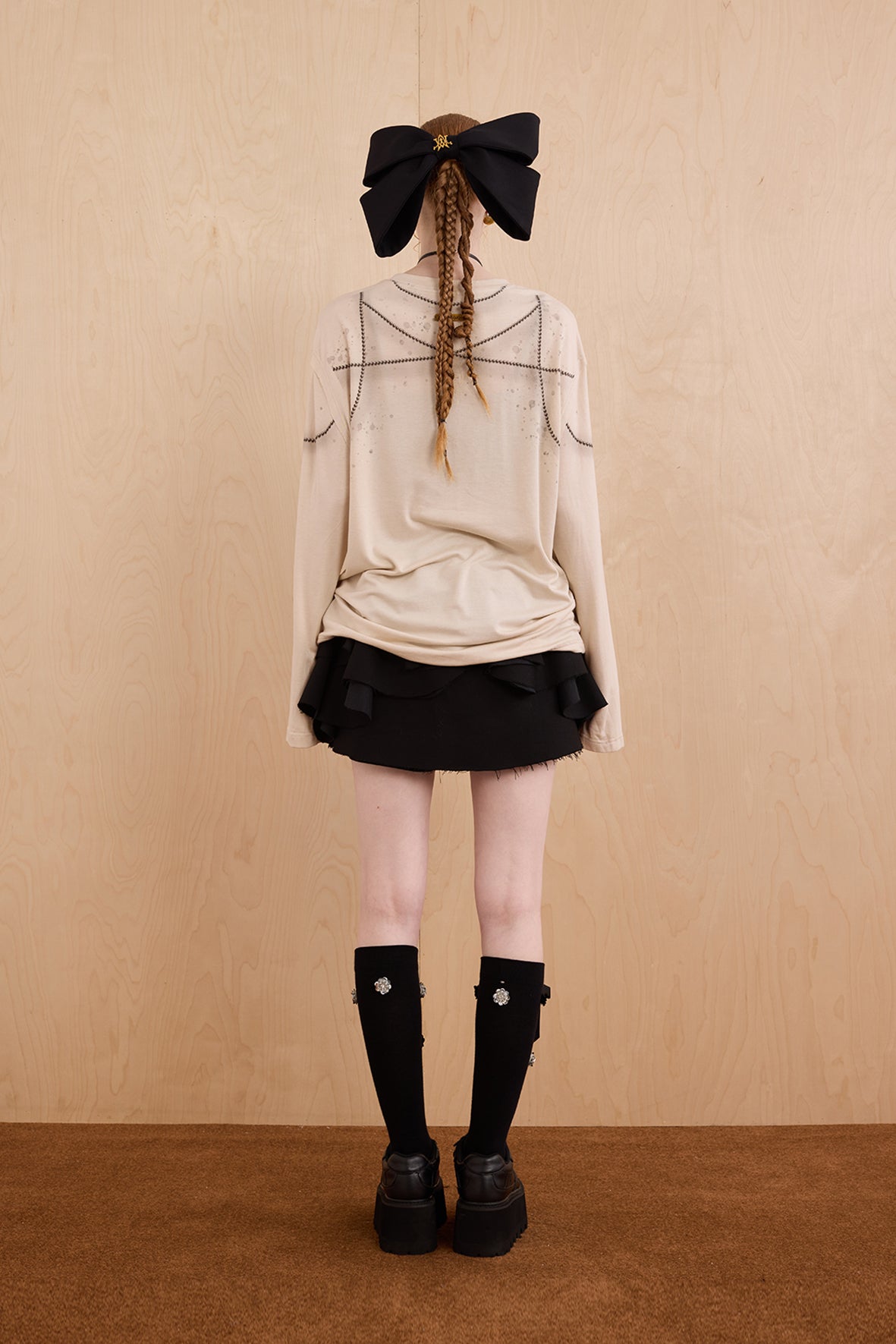 Model in wool-cashmere sweater with crystal chandelier graphic – WEANCHEAM