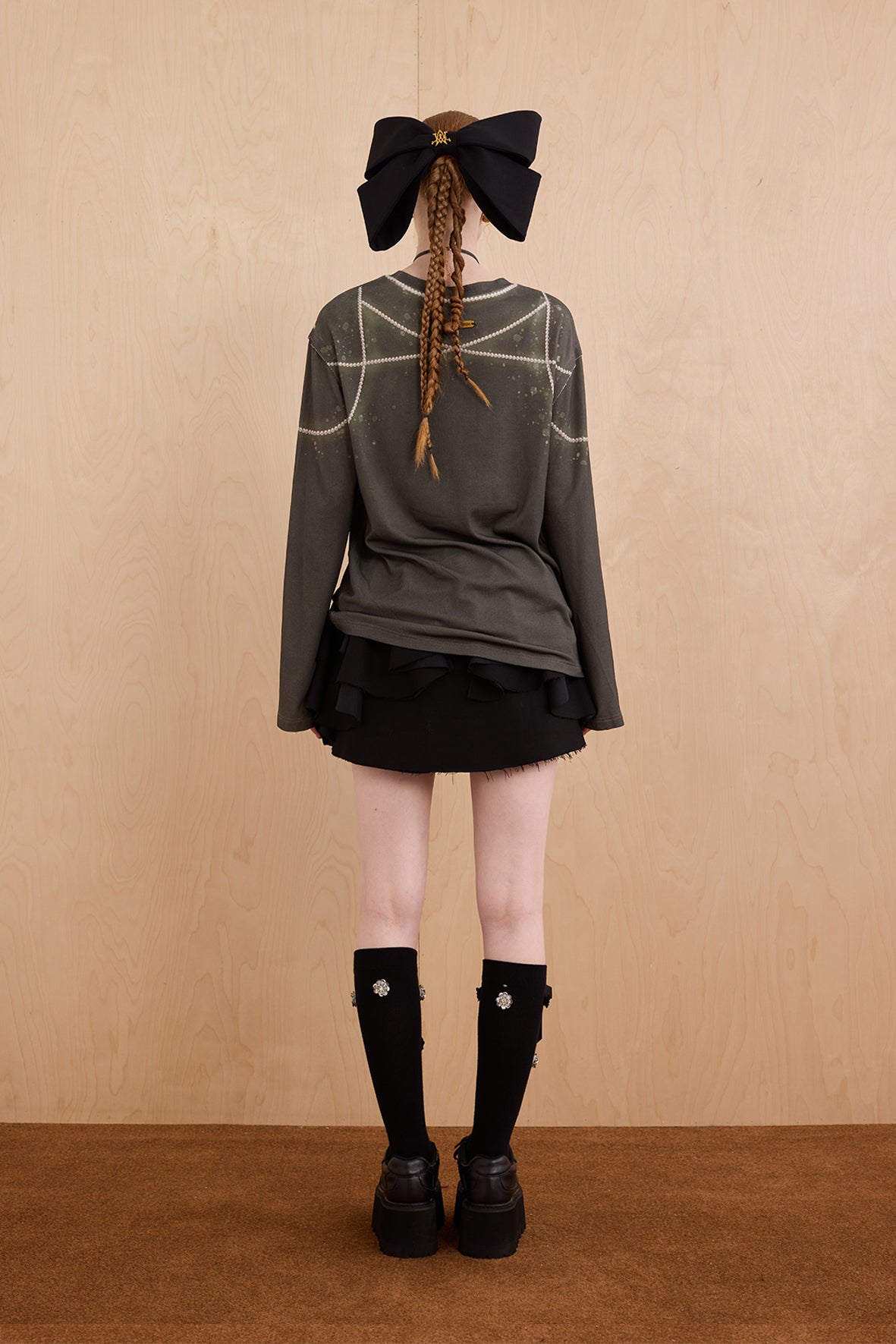Model in wool-cashmere sweater with crystal chandelier graphic – WEANCHEAM
