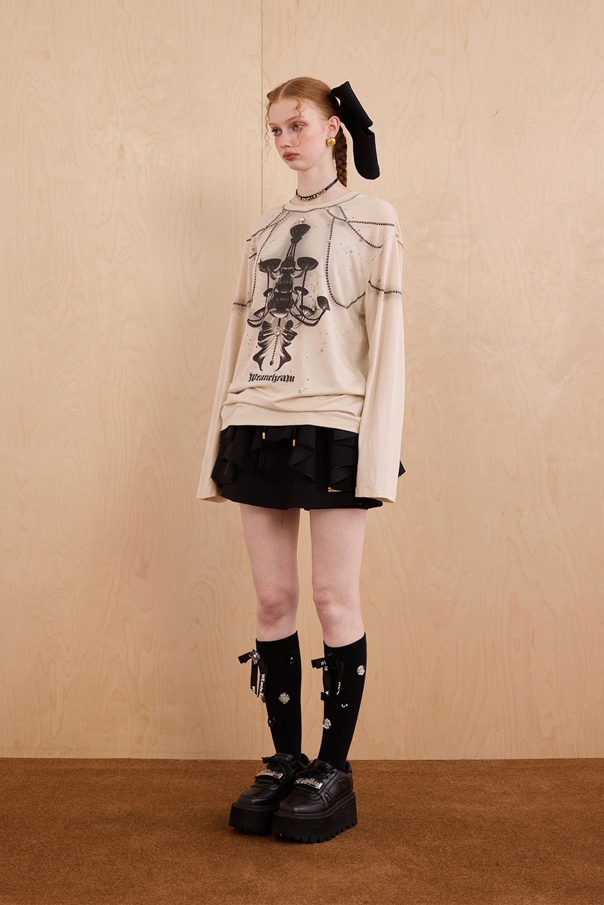 Model in wool-cashmere sweater with crystal chandelier graphic – WEANCHEAM