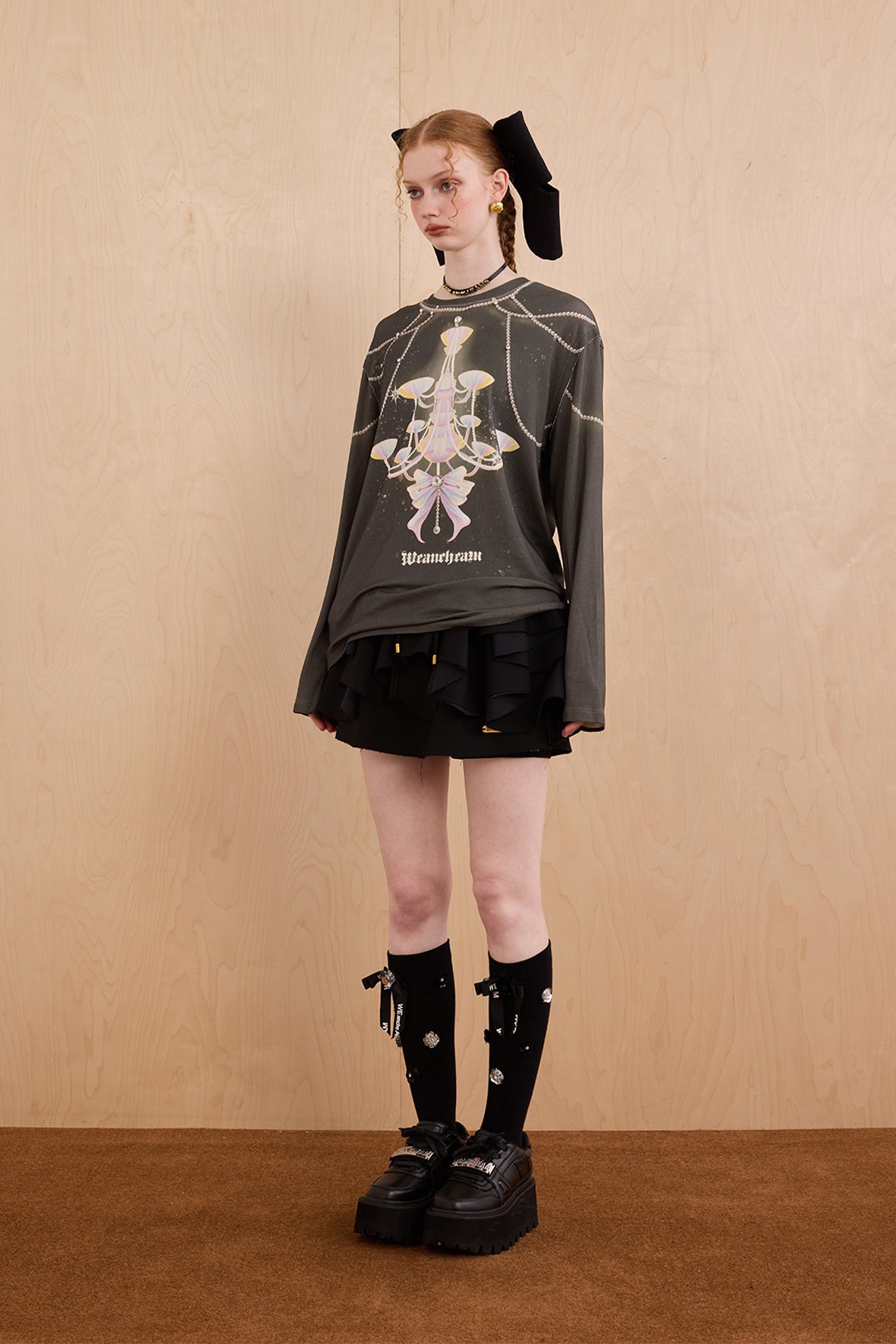 Model in wool-cashmere sweater with crystal chandelier graphic – WEANCHEAM