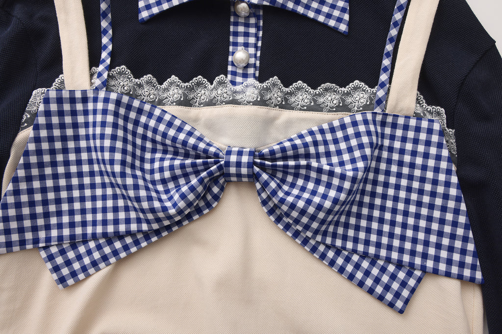 Close-up of bow-tie bandeau and halter layered detail on cotton slim-fit polo shirt