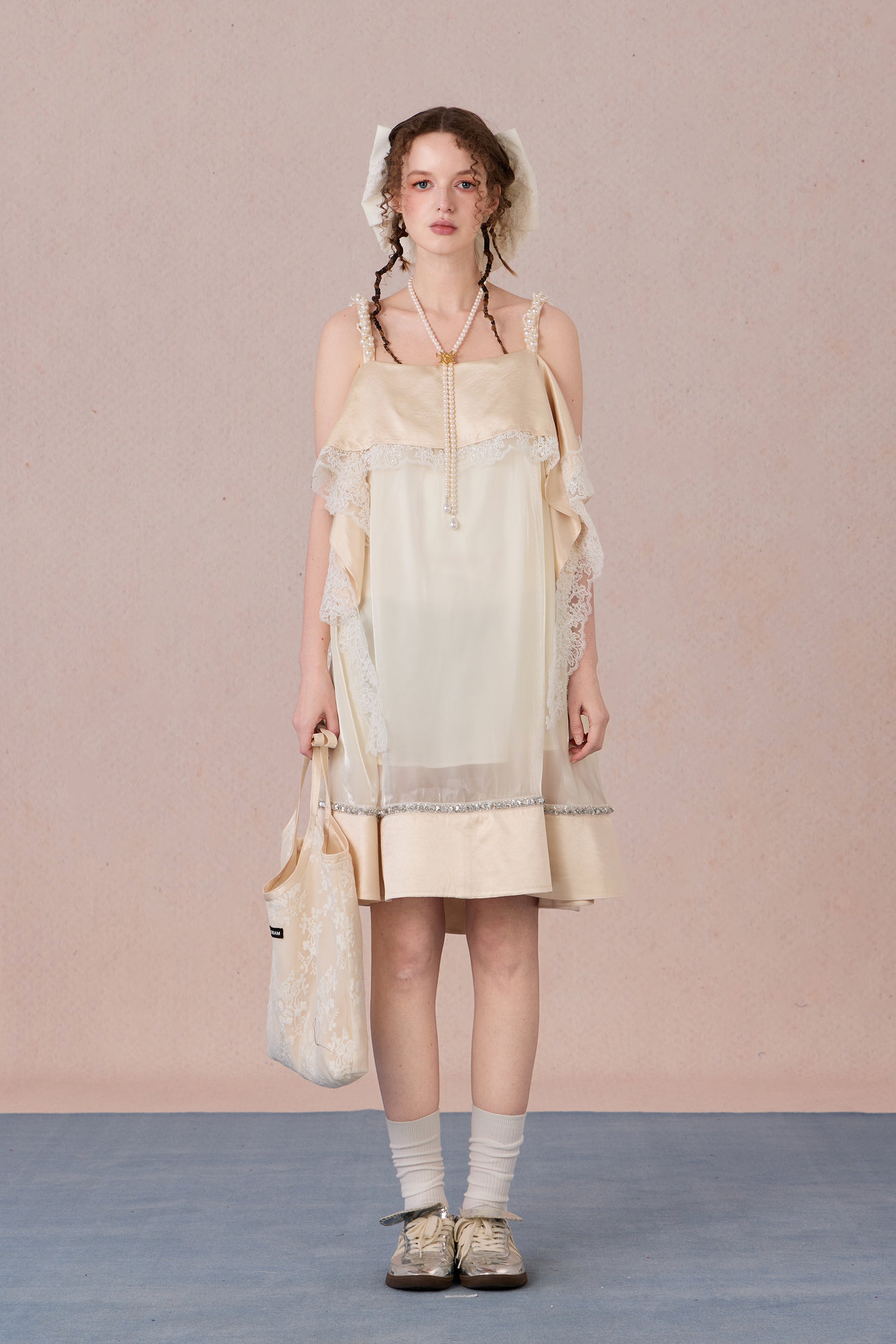Model in strapless satin mesh dress with pearl halter – WEANCHEAM