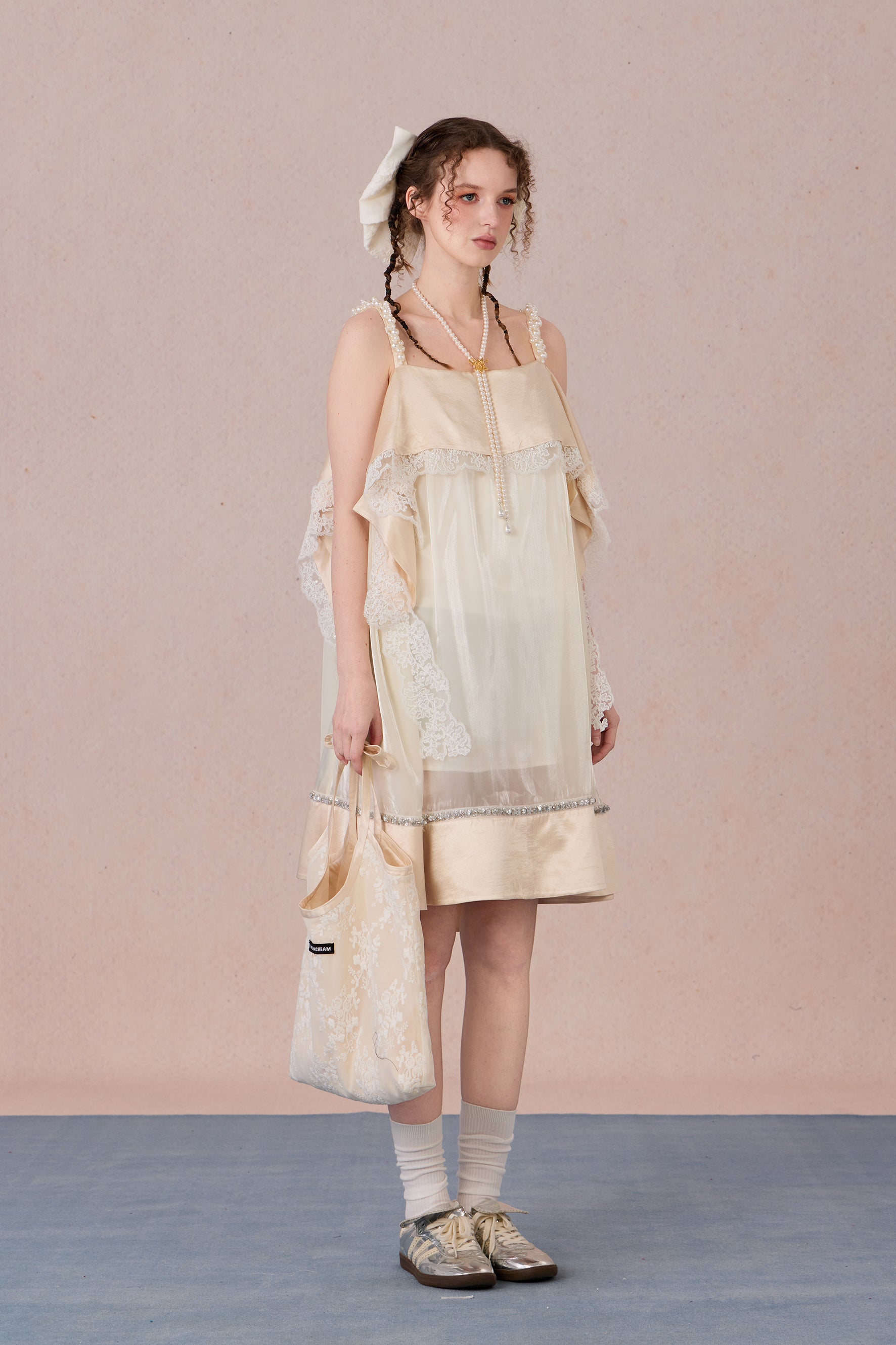 Model in strapless satin mesh dress with pearl halter – WEANCHEAM