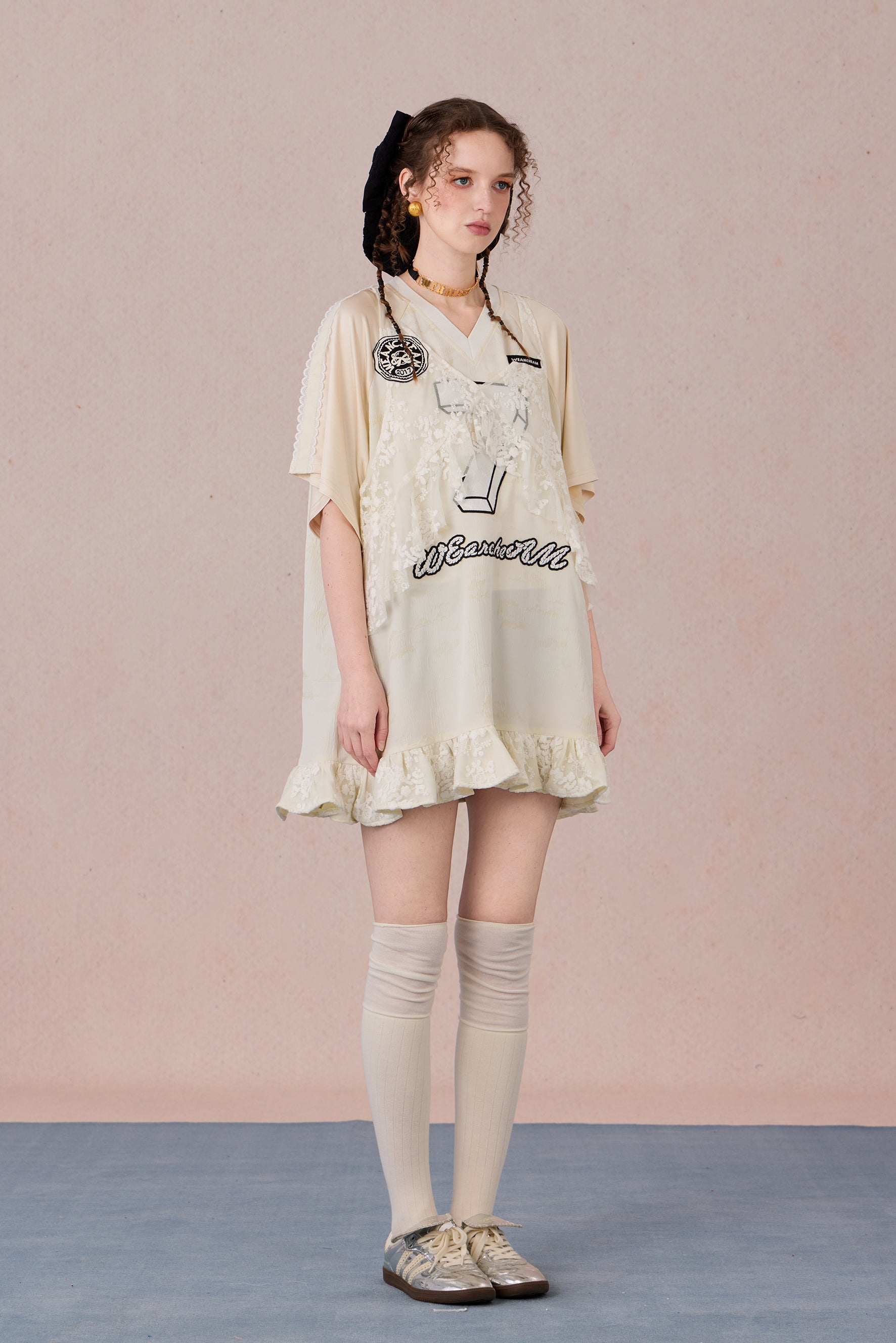 Summer sporty-style lace dress with flowing ruffle hem and halter neckline