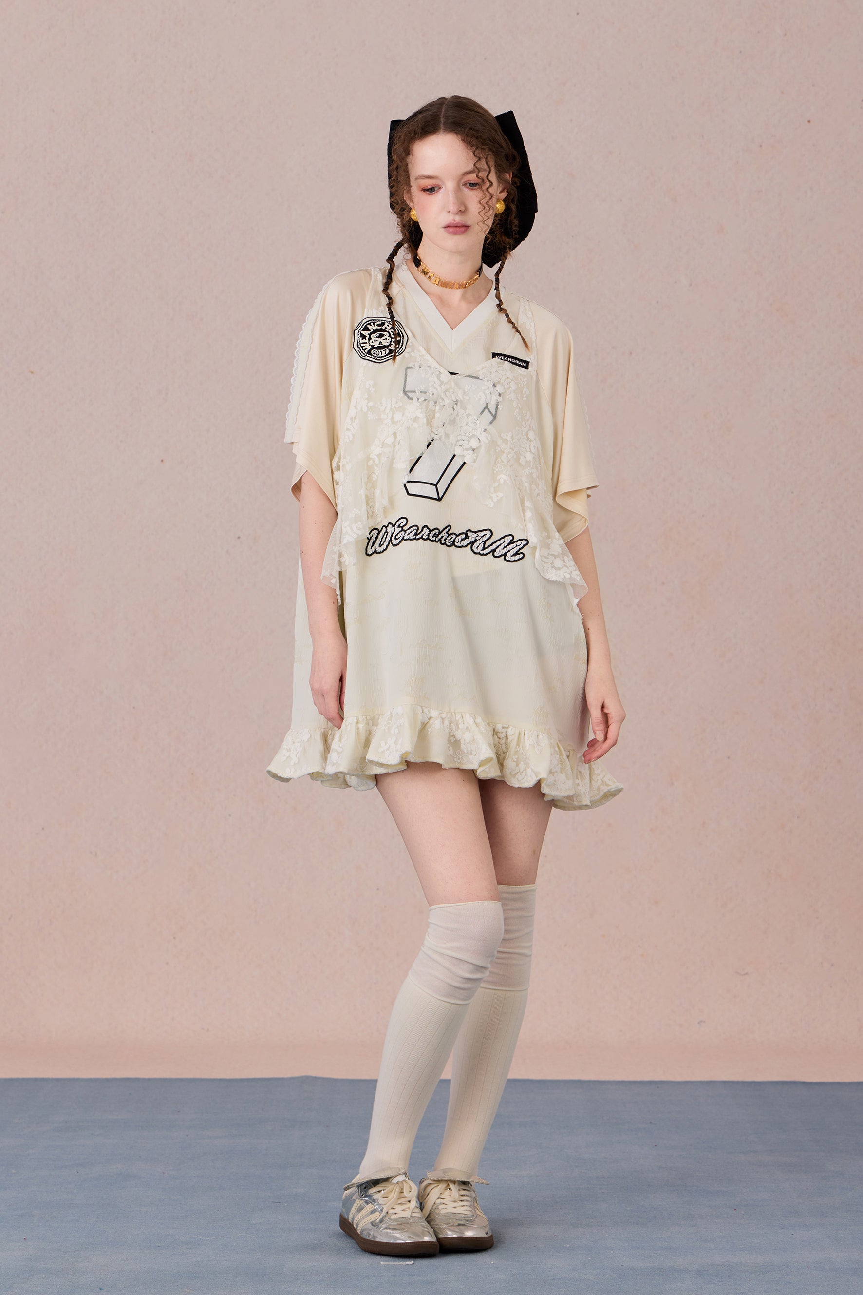 Summer sporty-style lace dress with flowing ruffle hem and halter neckline