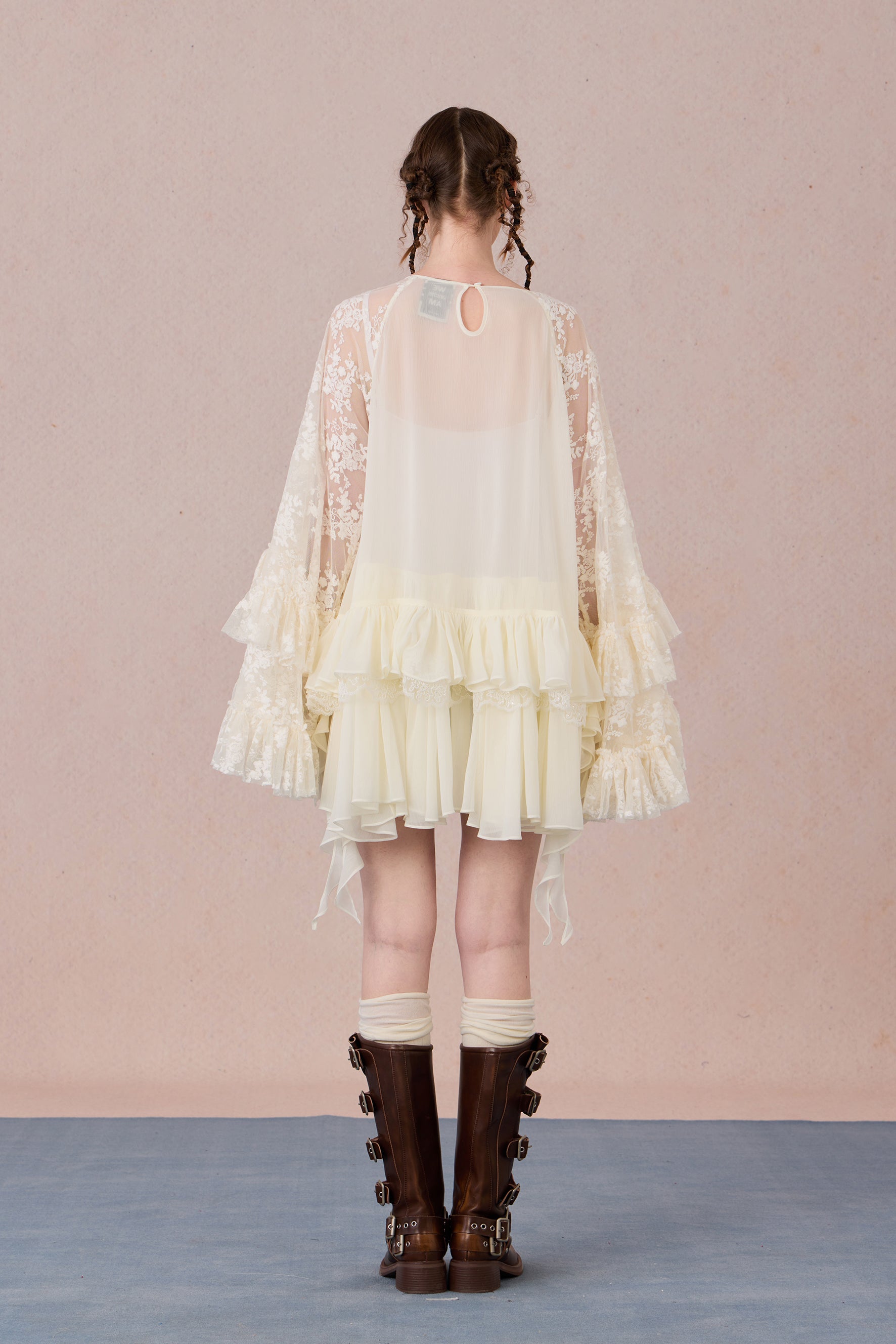 Model wearing vintage-inspired layered dress with sheer glow – WEANCHEAM