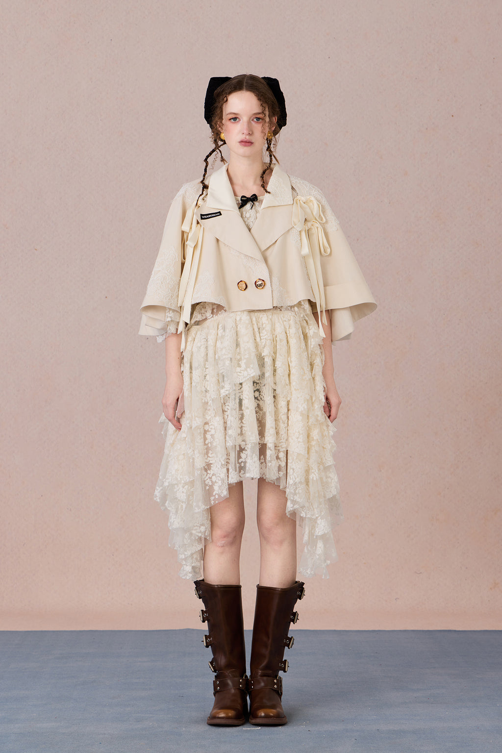 Short suit jacket with romantic lace trim and functional hood