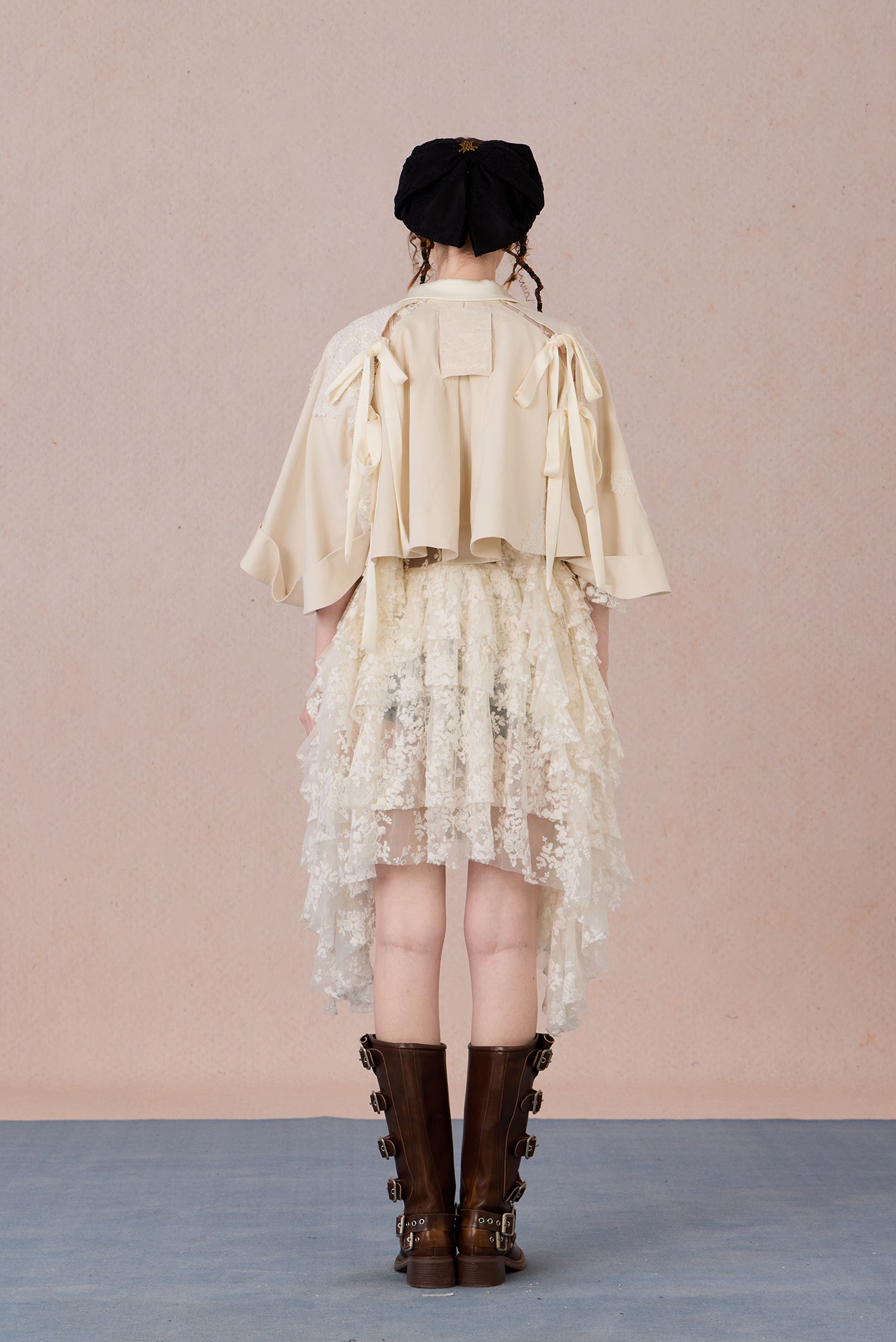 High-low hem lace jacket with adjustable fit and urban flair