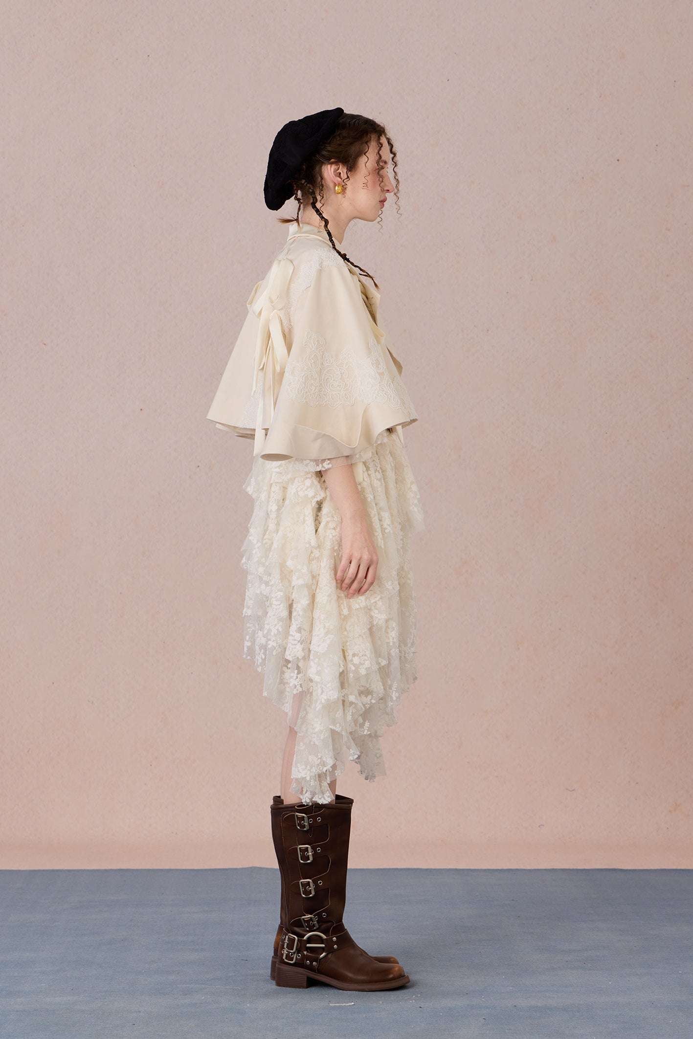 Short suit jacket with romantic lace trim and functional hood