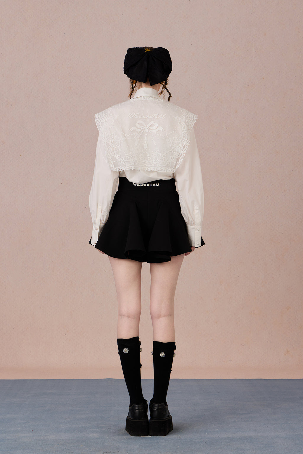 Back view of classic WEANCHEAM 3-in-1 shirt in motion