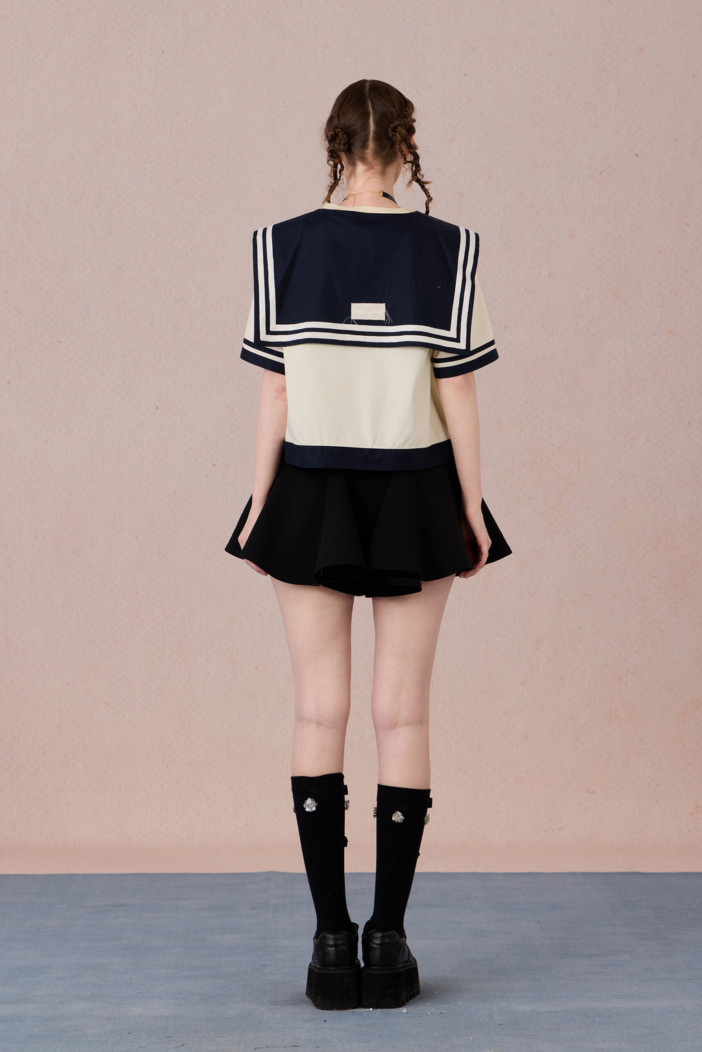 Oversized preppy T-shirt styled with retro campus outfit