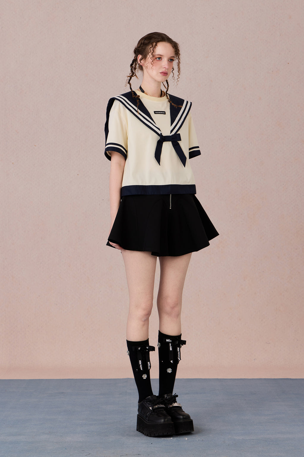 Oversized preppy T-shirt styled with retro campus outfit