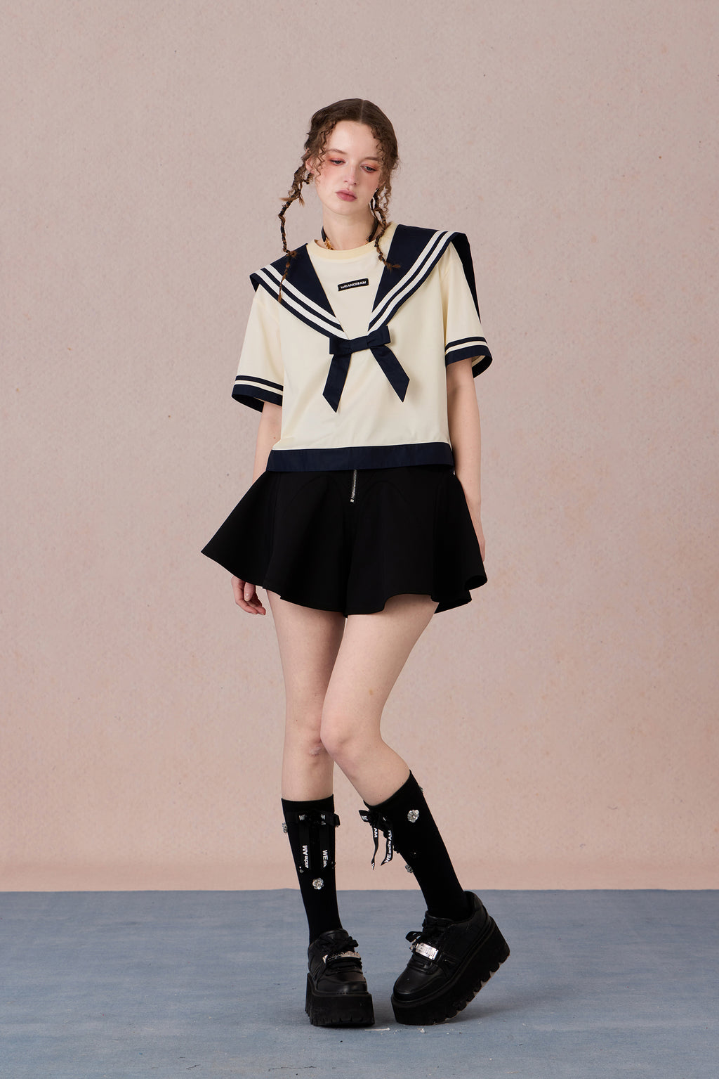 Oversized preppy T-shirt styled with retro campus outfit