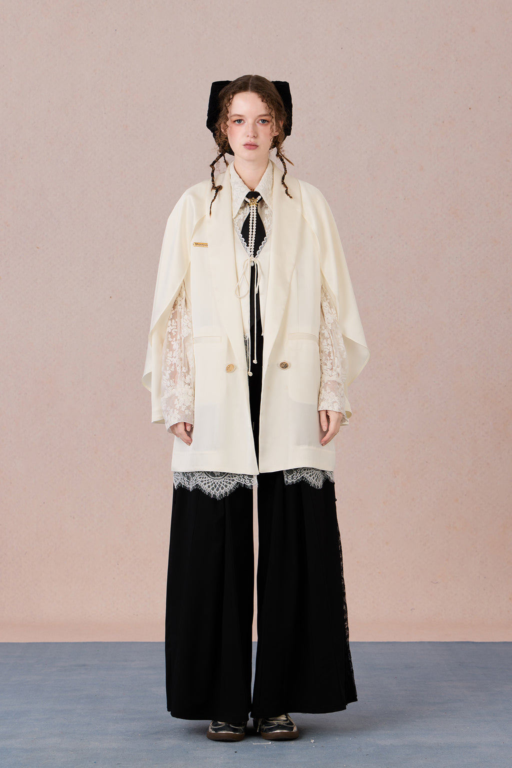 Layered lightweight jacket with lace-trimmed sleeves and medium length