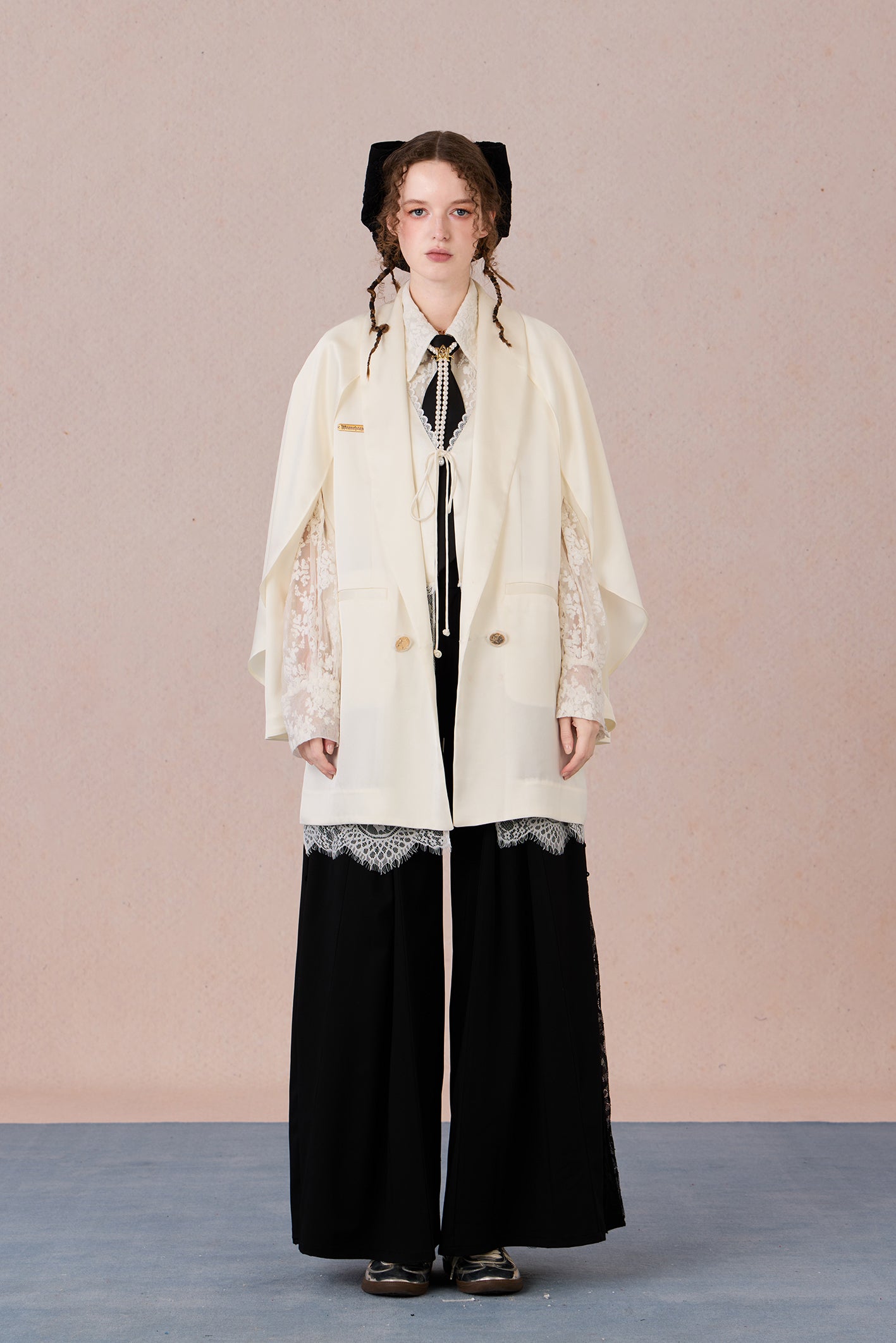 Layered lightweight jacket with lace-trimmed sleeves and medium length