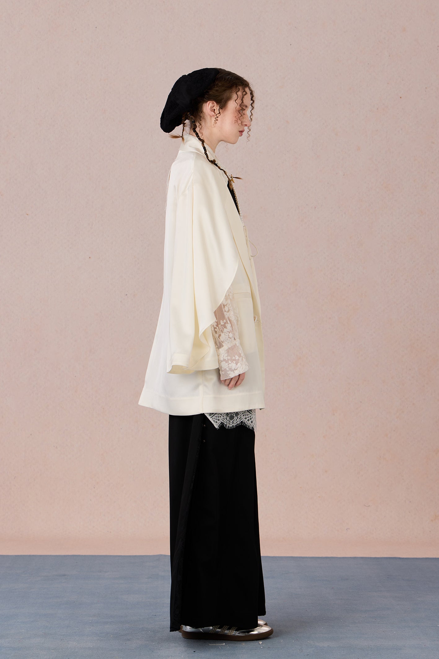 Layered lightweight jacket with lace-trimmed sleeves and medium length