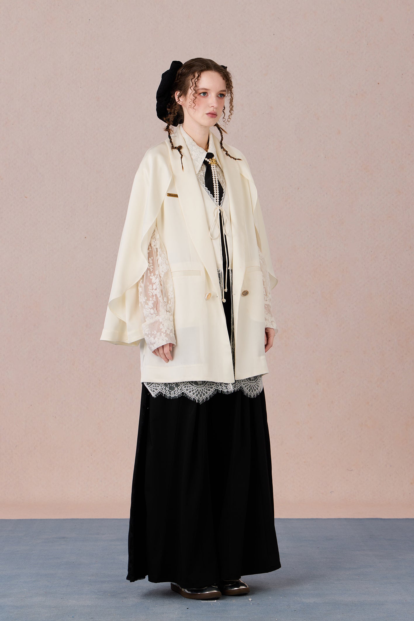 Layered lightweight jacket with lace-trimmed sleeves and medium length