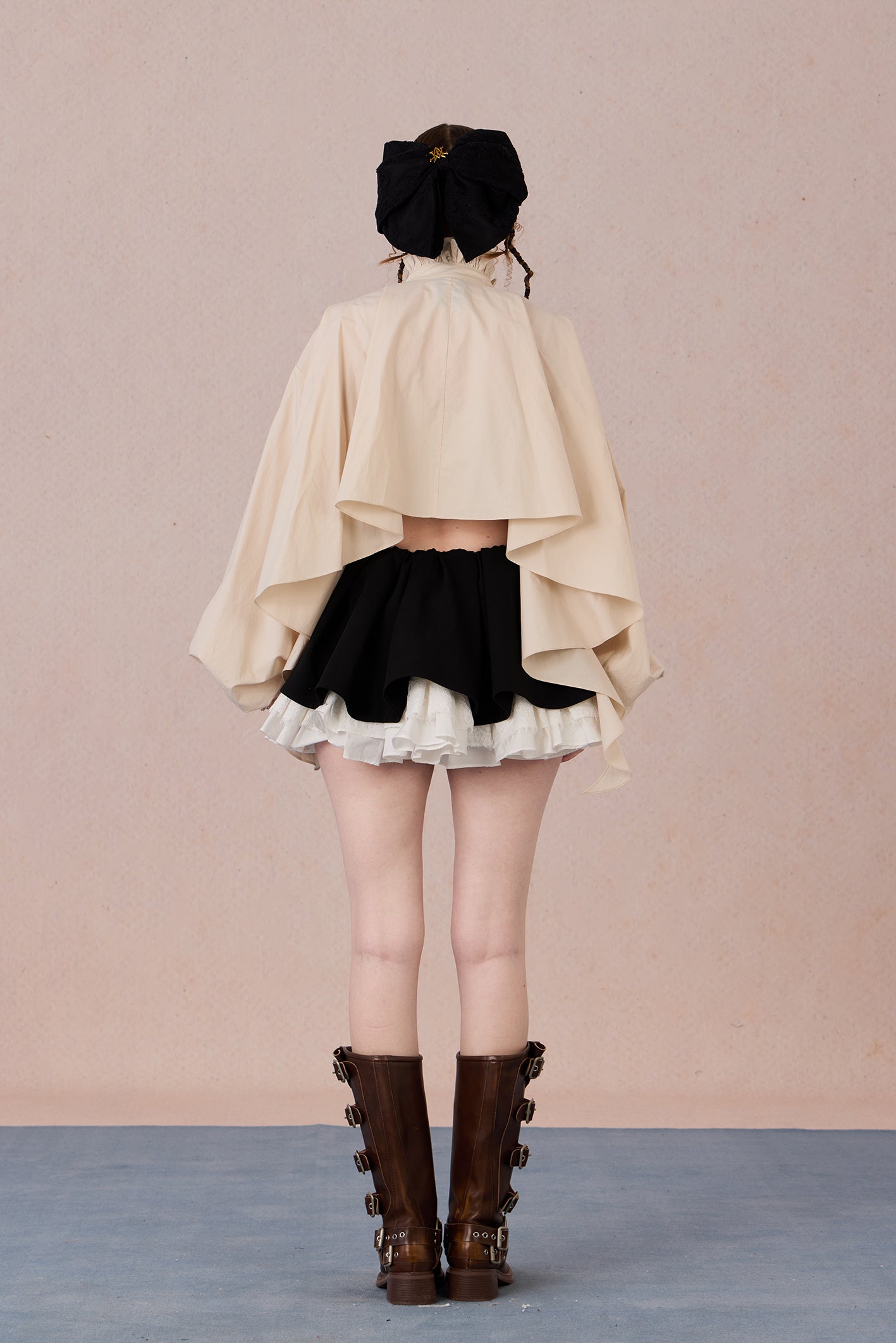 Flowing romantic shirt with beaded floral details and ruffled cuffs