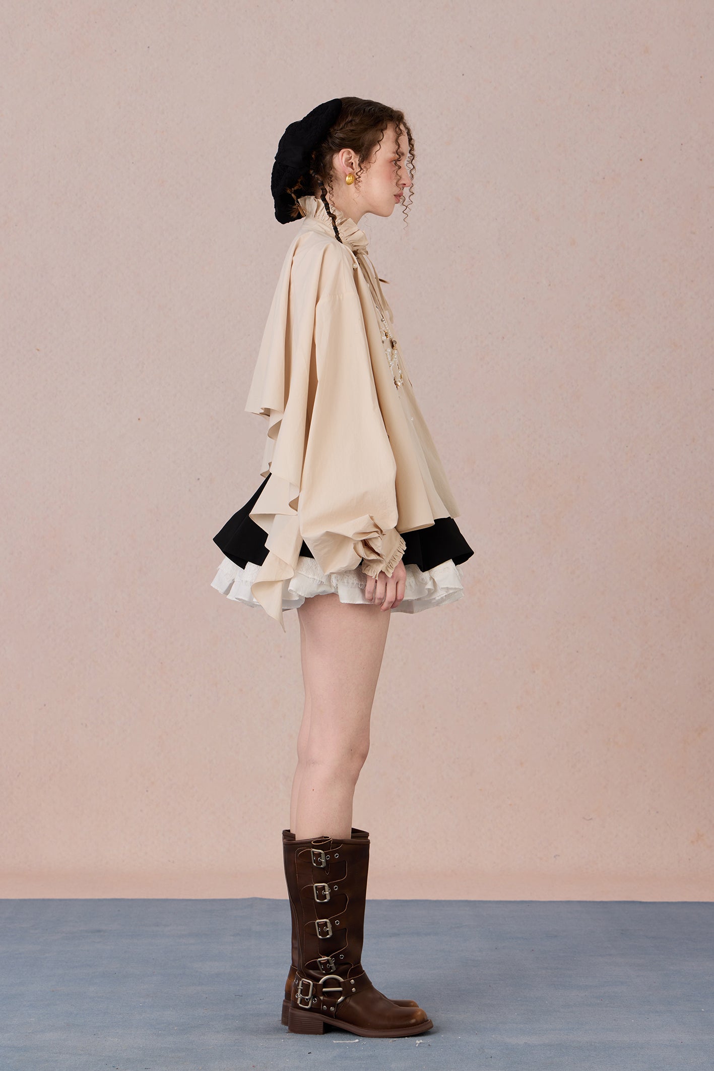Flowing romantic shirt with beaded floral details and ruffled cuffs