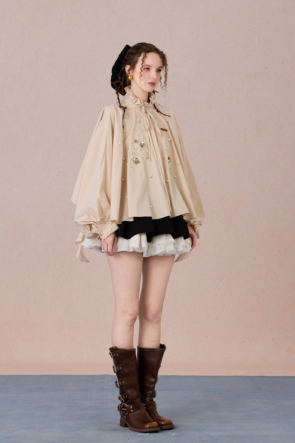 Flowing romantic shirt with beaded floral details and ruffled cuffs