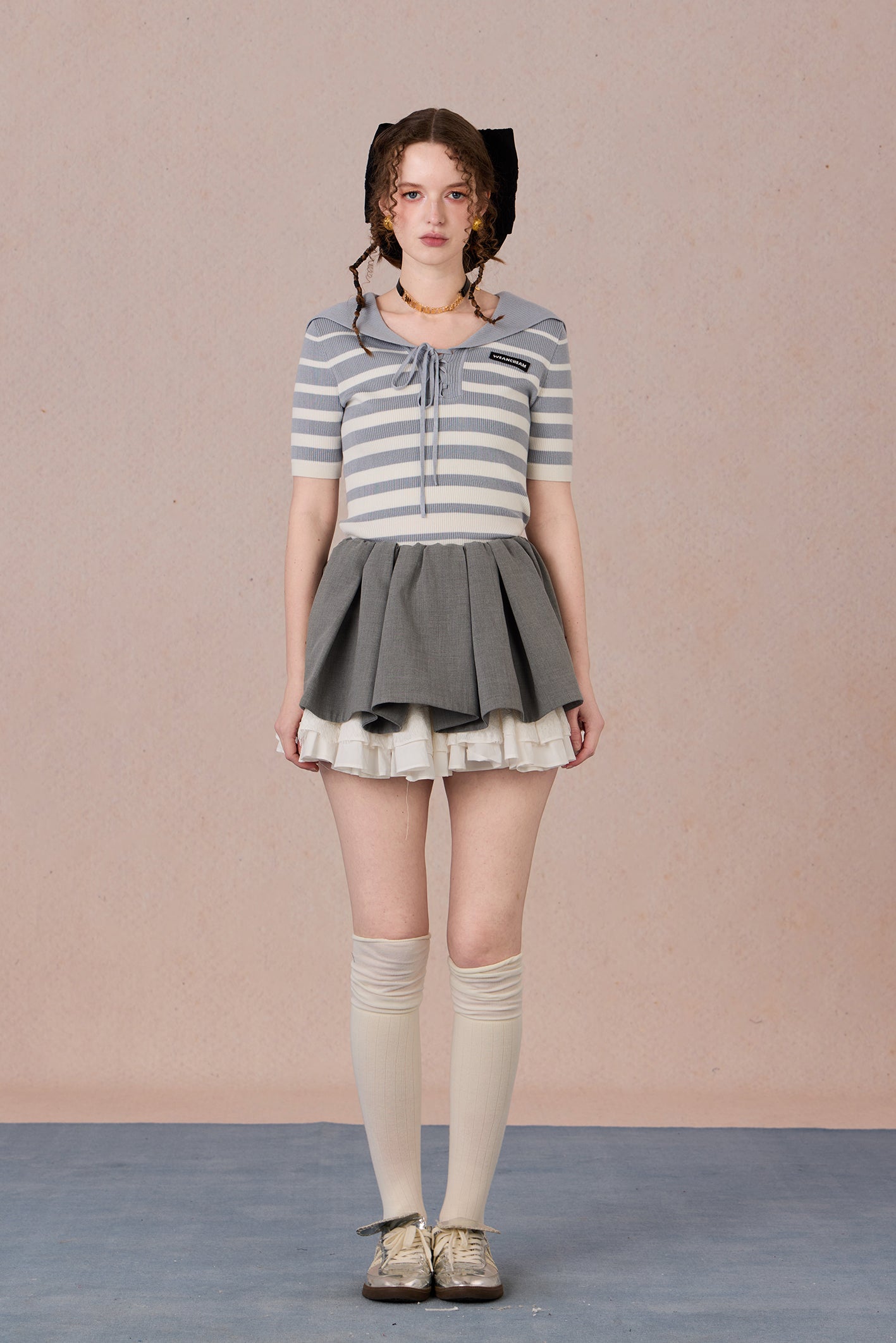 Casual chic styling of embroidered striped T-shirt with contrast neckline