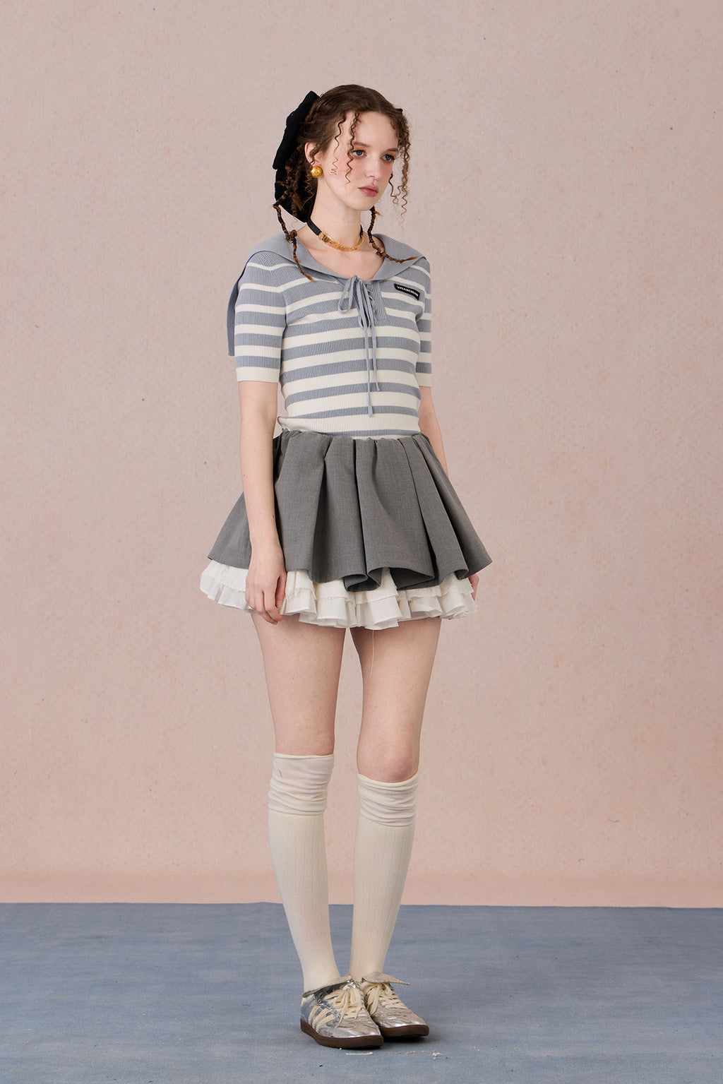 Casual chic styling of embroidered striped T-shirt with contrast neckline