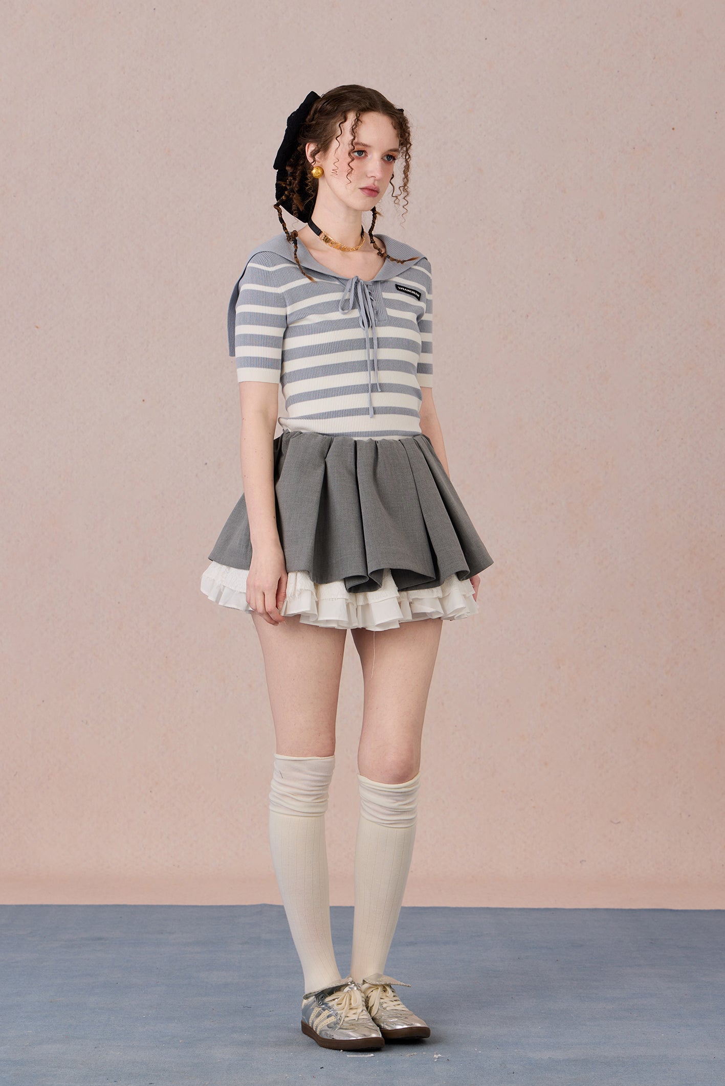 Casual chic styling of embroidered striped T-shirt with contrast neckline