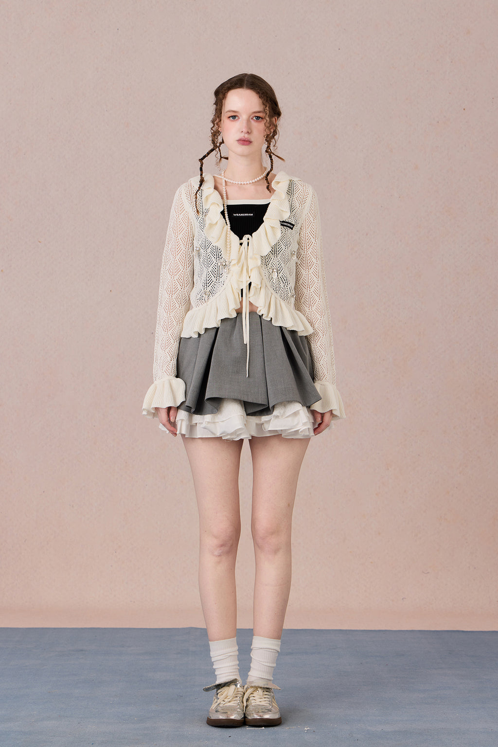 Feminine spring knit jacket styled with skirt
