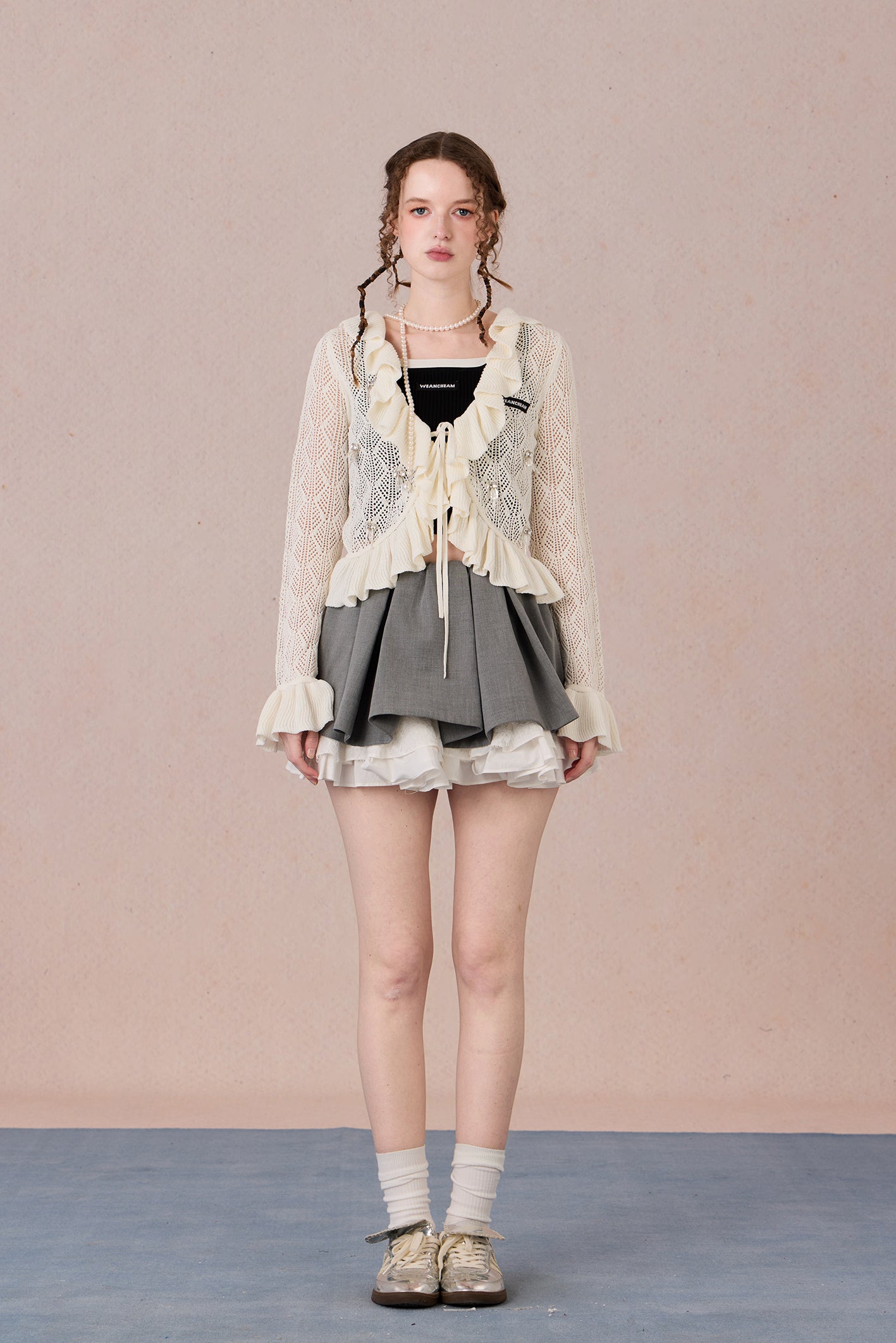 Feminine spring knit jacket styled with skirt