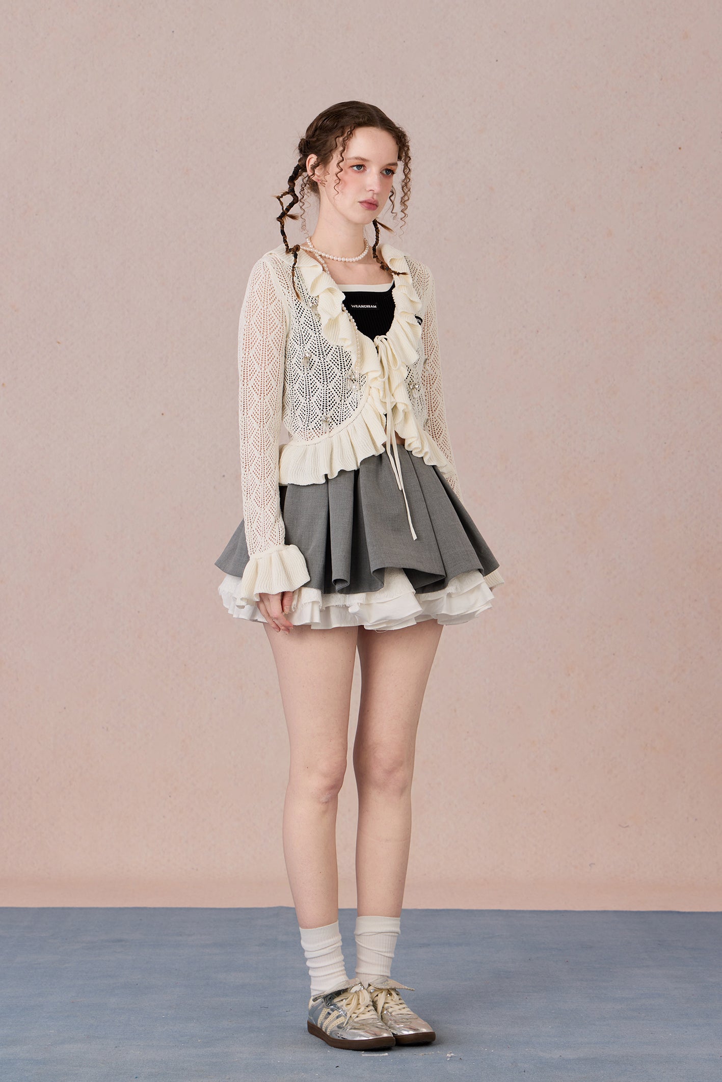 Feminine spring knit jacket styled with skirt