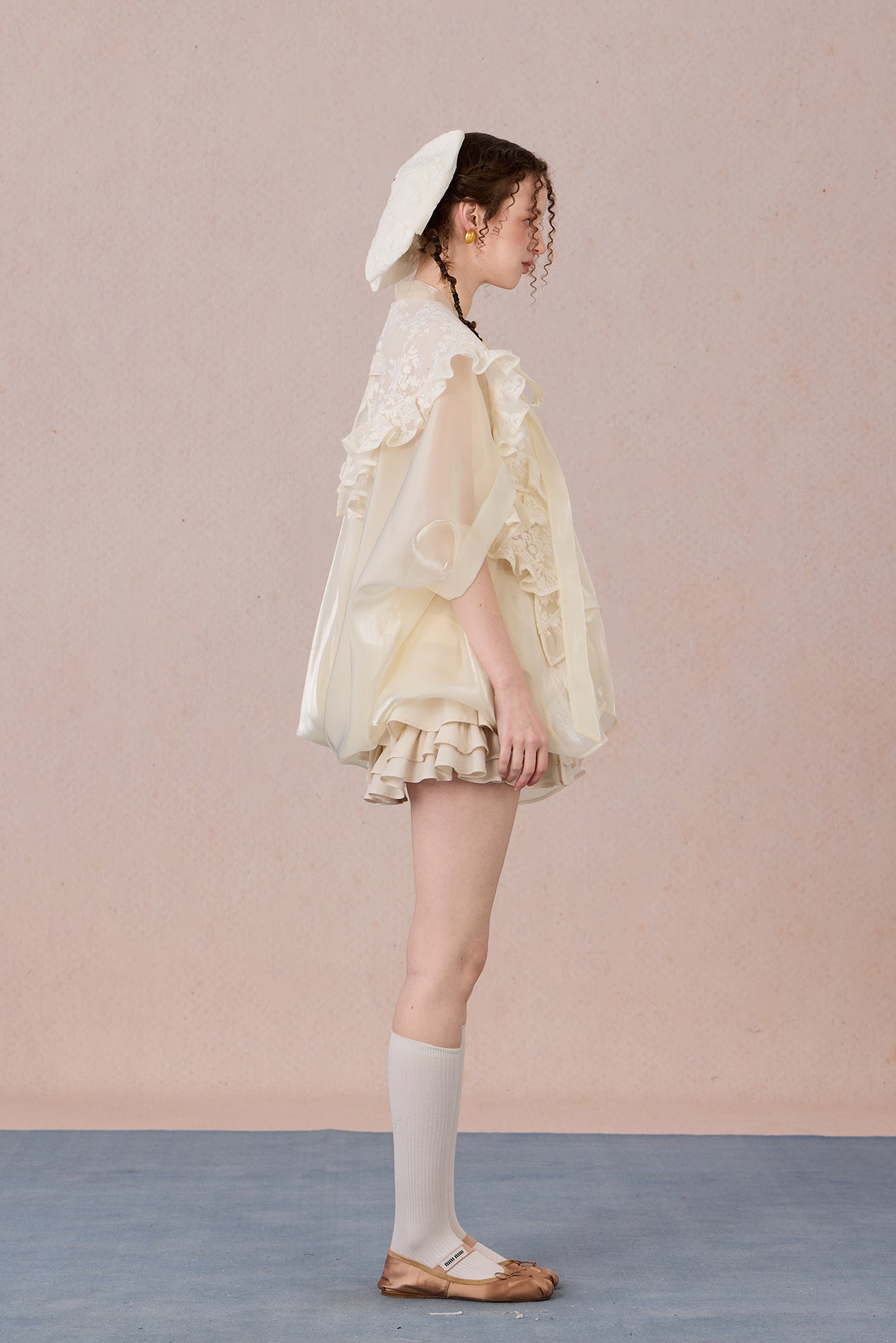 Flowing robe-style layering jacket with pearl sheen and soft lapels