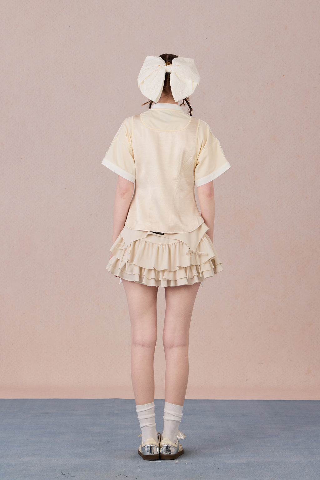 Feminine cotton blend top with handcrafted bead detail