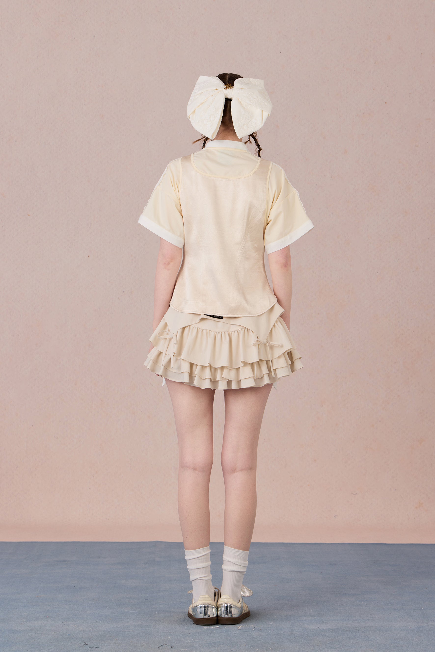 Feminine cotton blend top with handcrafted bead detail