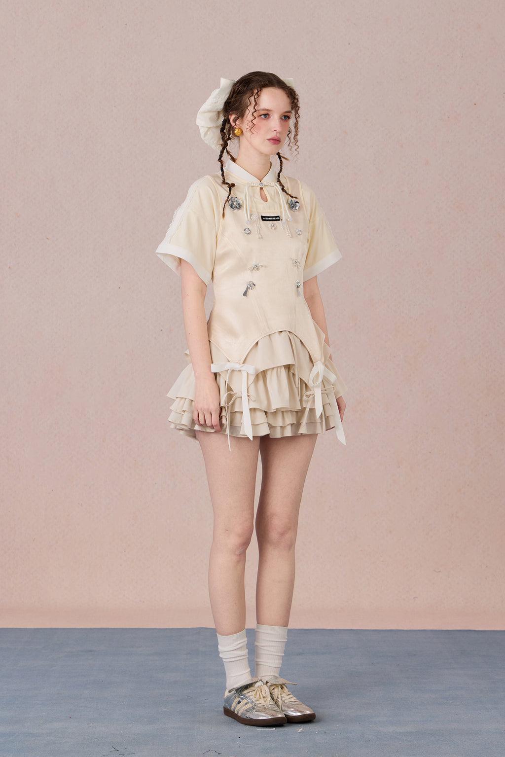 Feminine cotton blend top with handcrafted bead detail
