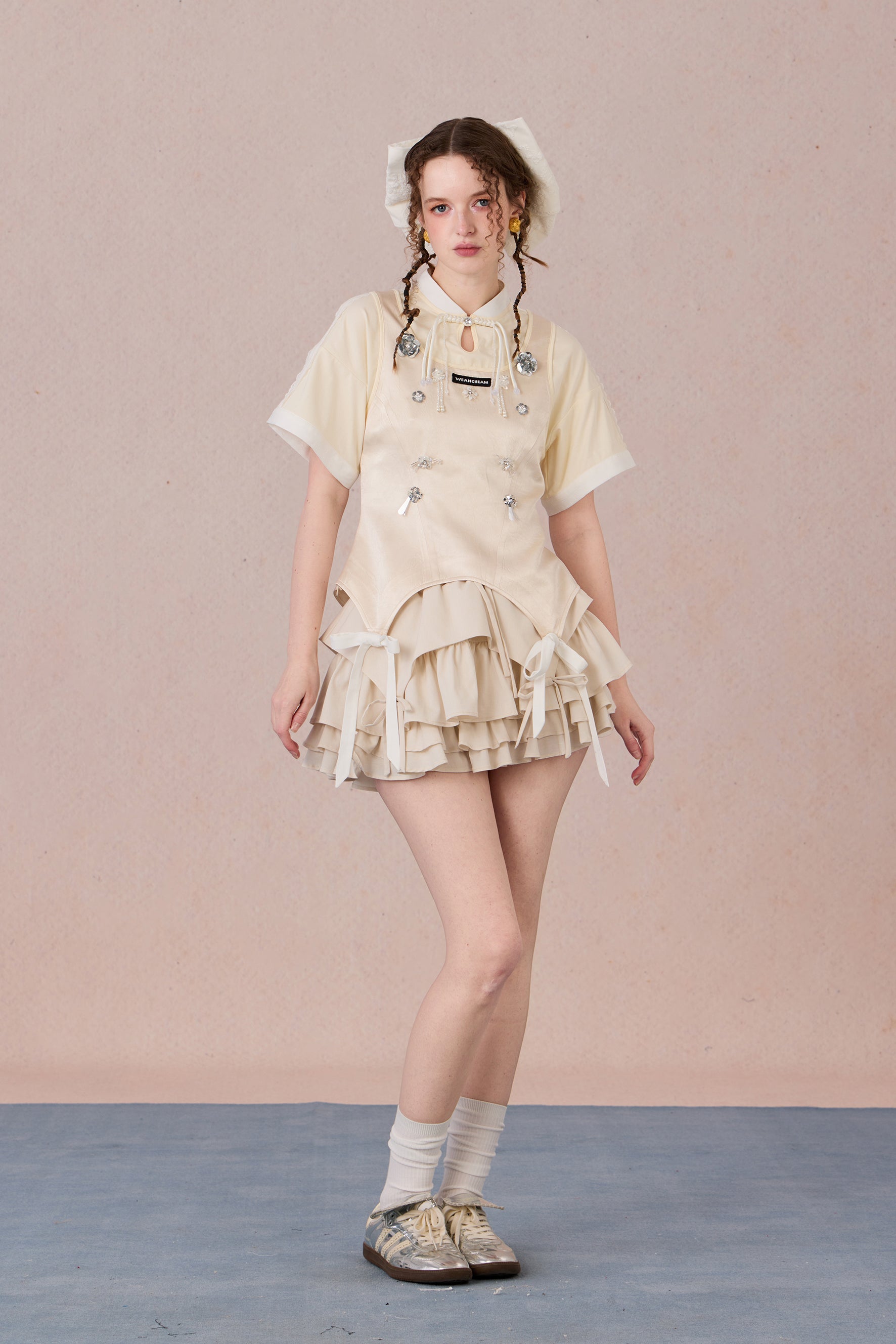 Feminine cotton blend top with handcrafted bead detail