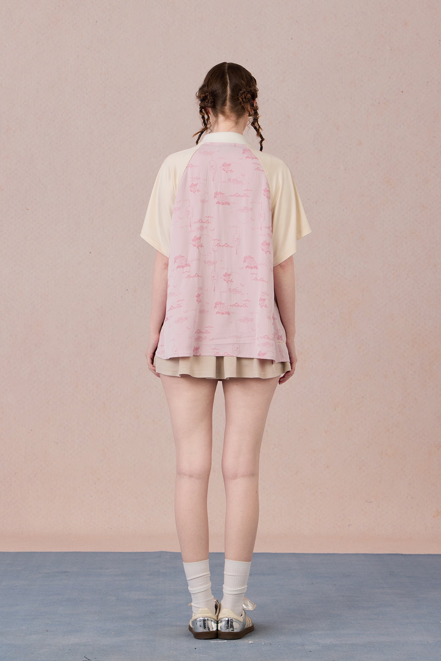  Soft draping silhouette with modern Chinese-inspired neckline