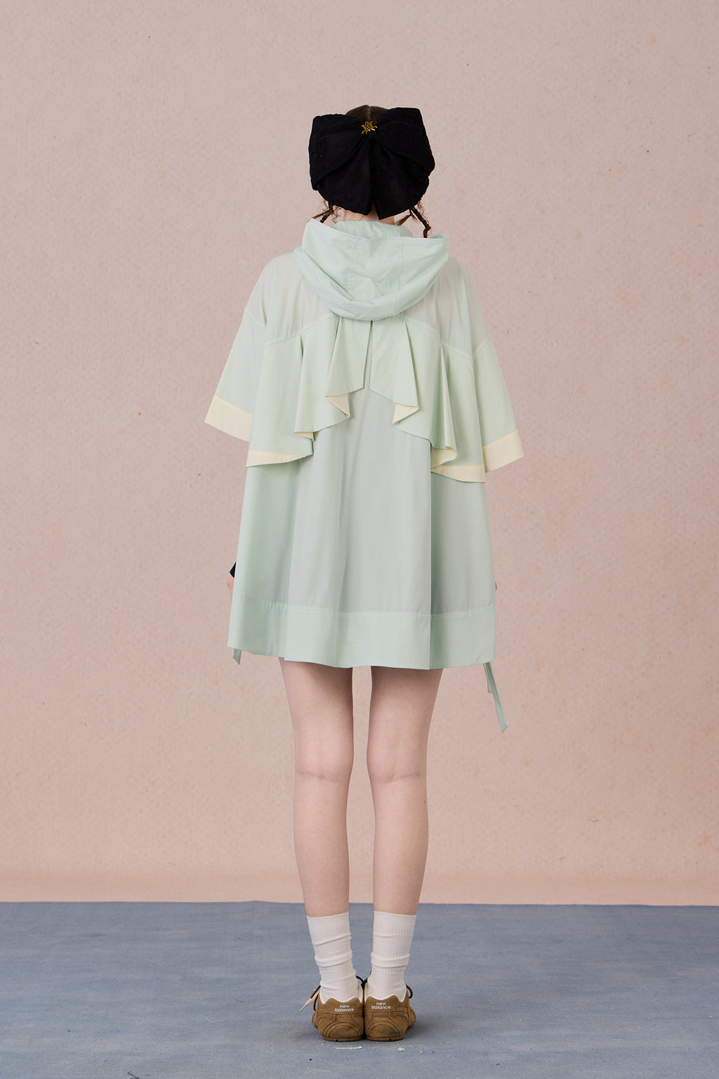 Adjustable hemline jacket with urban hood and lace detailing
