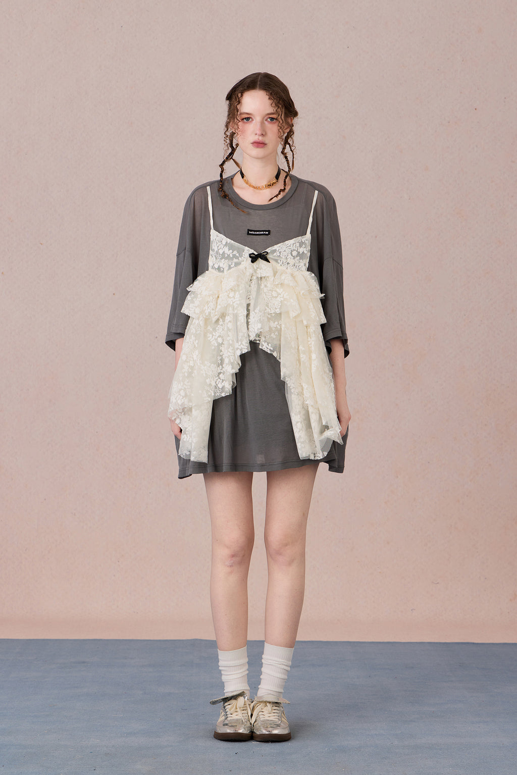  Layered cotton blend top with sheer base and romantic lace