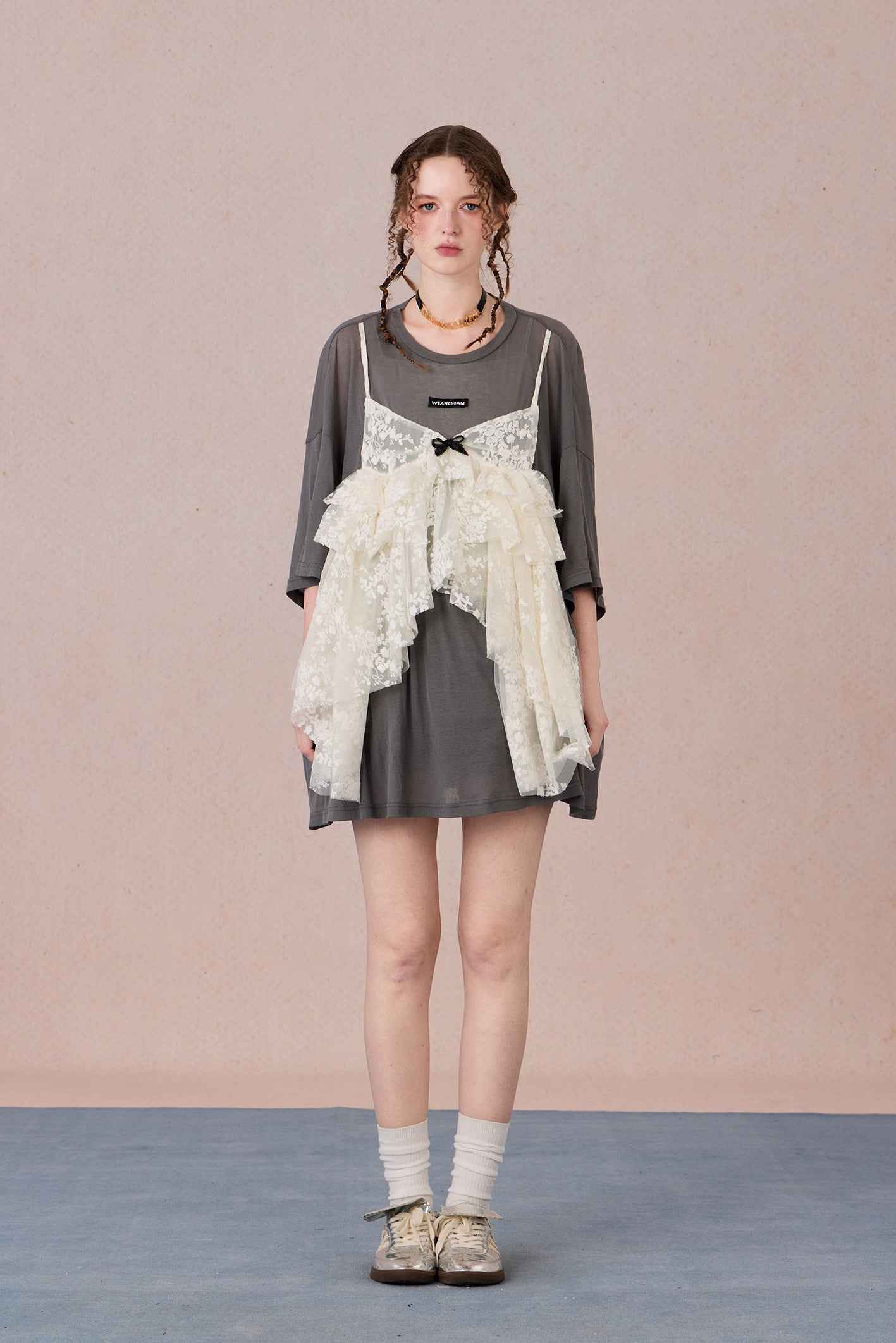  Layered cotton blend top with sheer base and romantic lace