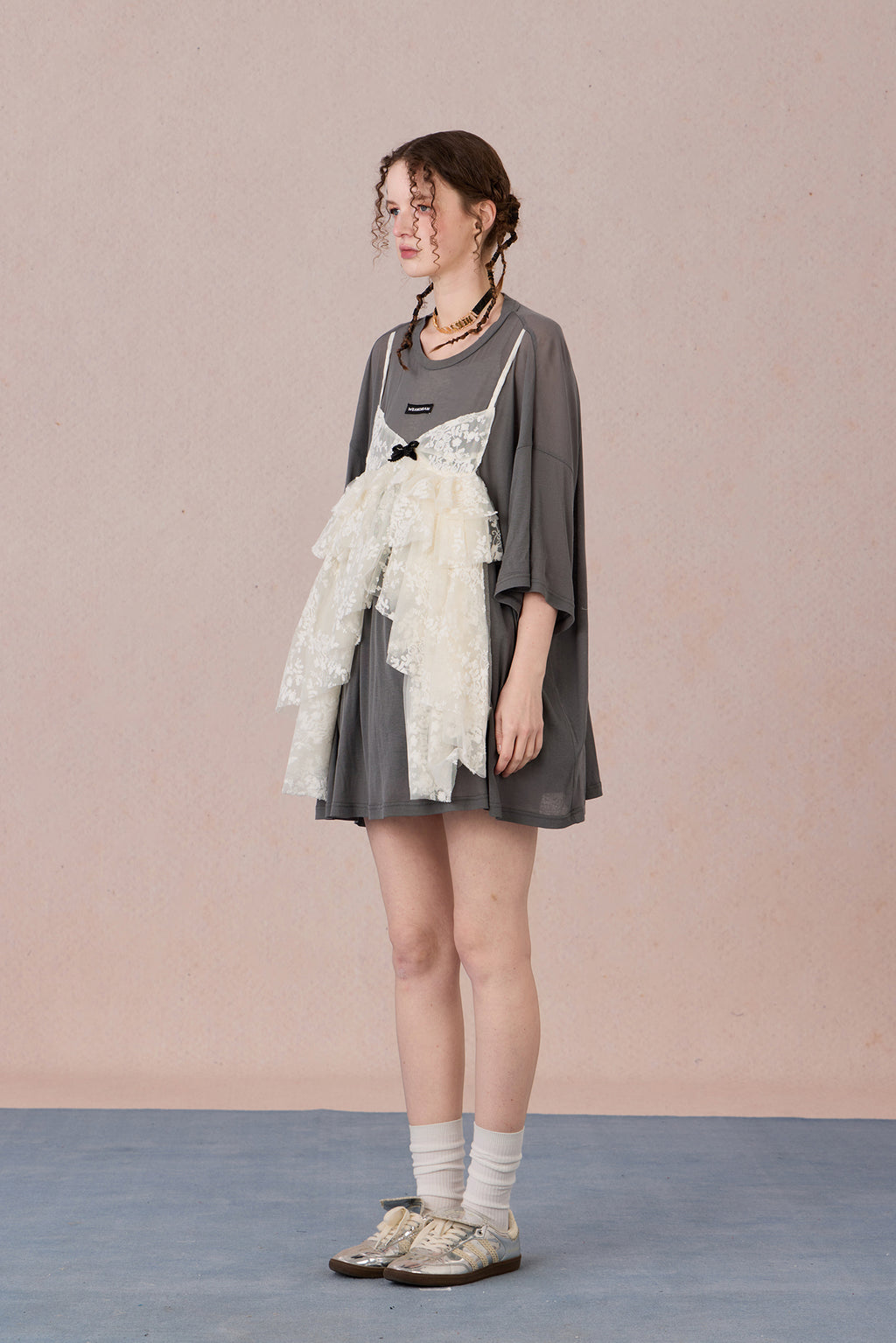  Layered cotton blend top with sheer base and romantic lace