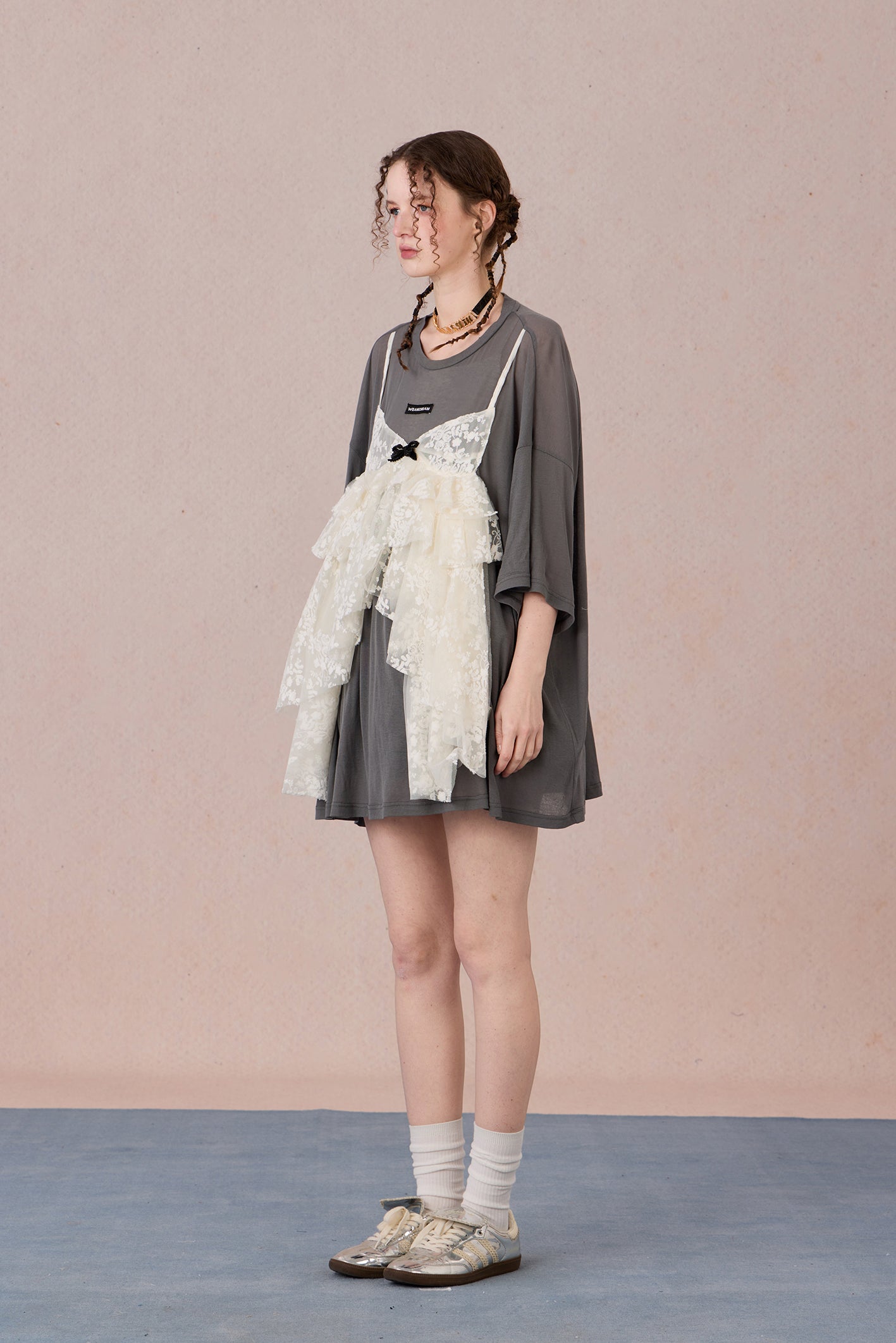  Layered cotton blend top with sheer base and romantic lace